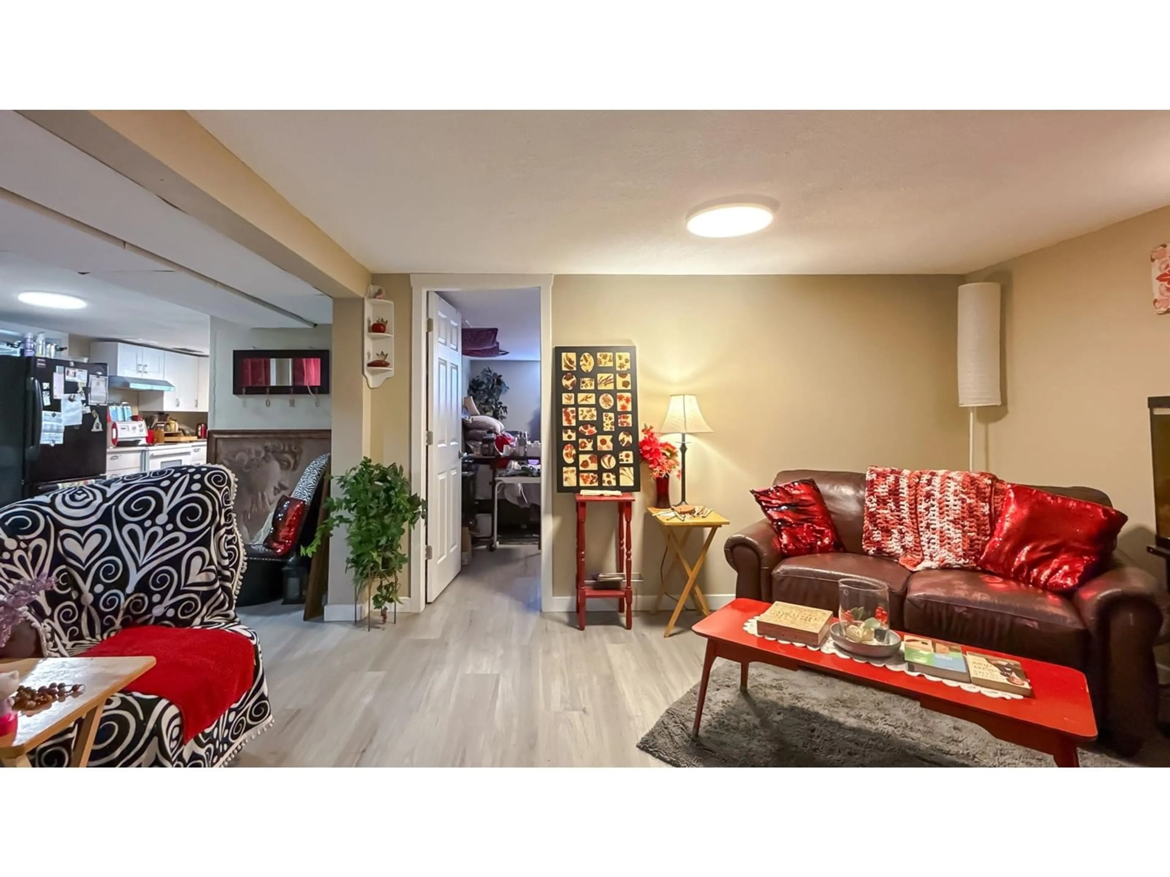Living room with furniture, wood/laminate floor for 9762 CORBOULD STREET, Chilliwack British Columbia V2P4B5