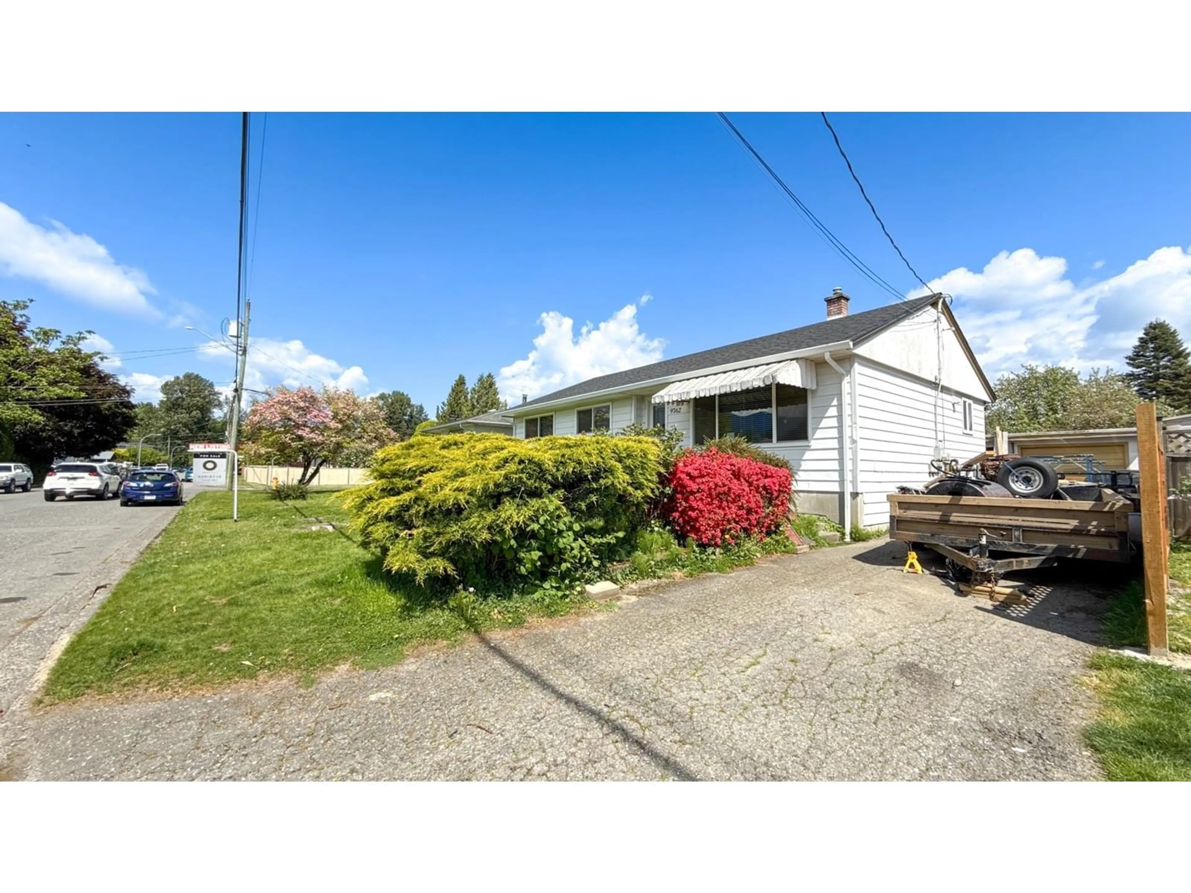 A pic from outside/outdoor area/front of a property/back of a property/a pic from drone, street for 9762 CORBOULD STREET, Chilliwack British Columbia V2P4B5