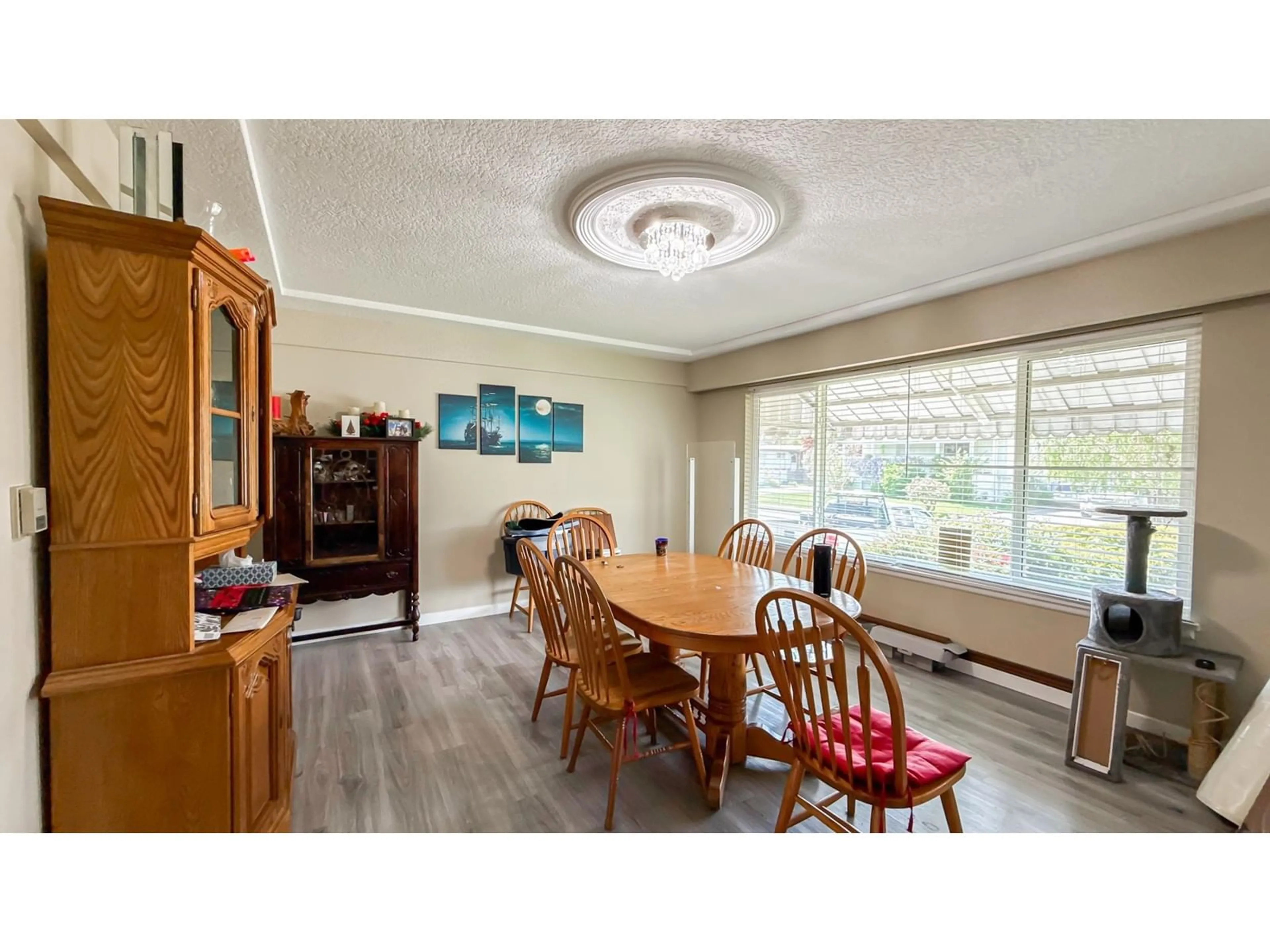 Dining room, wood/laminate floor for 9762 CORBOULD STREET, Chilliwack British Columbia V2P4B5