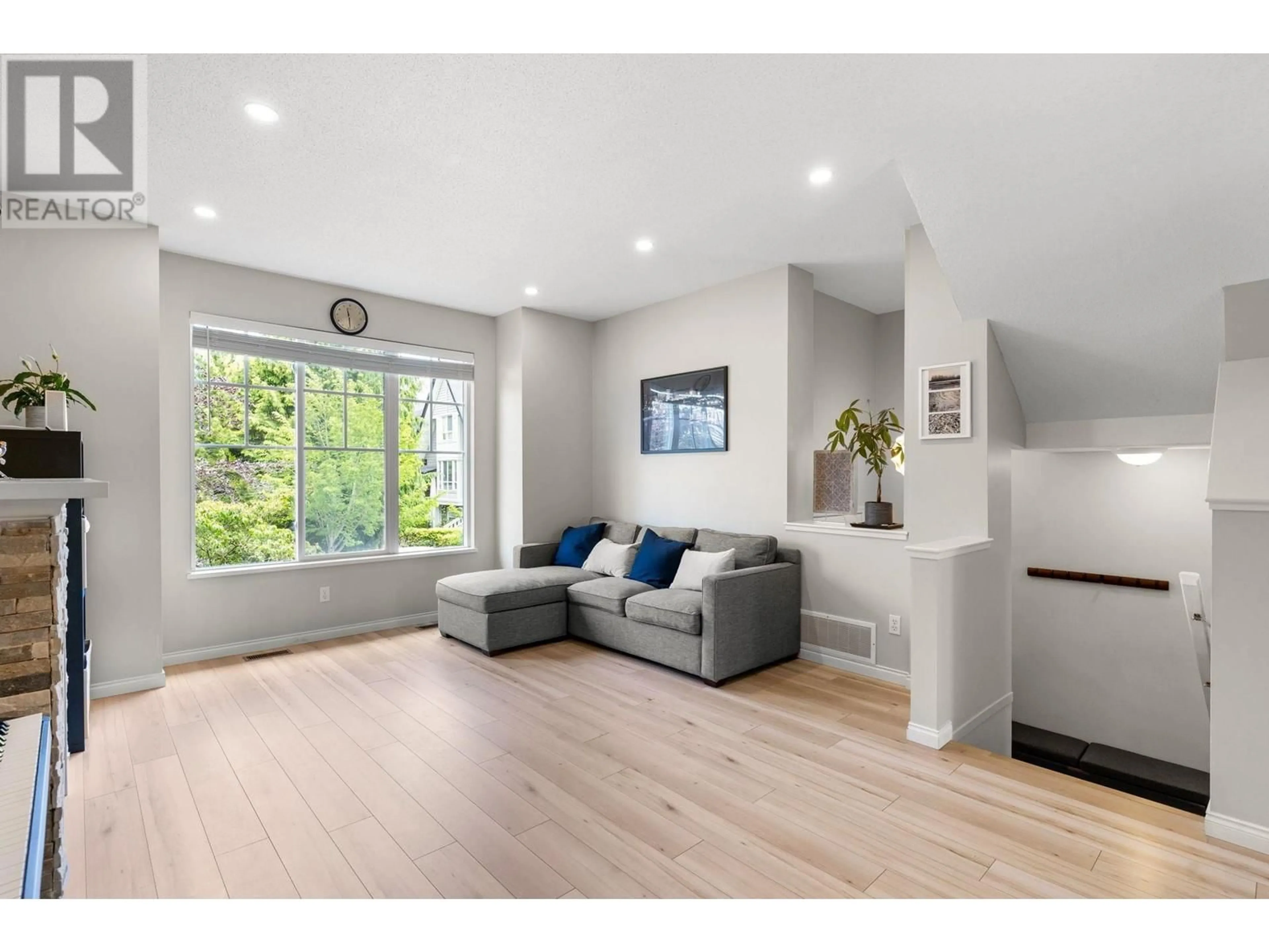 Living room with furniture, wood/laminate floor for 18 - 7233 HEATHER STREET, Richmond British Columbia V6Y4J8