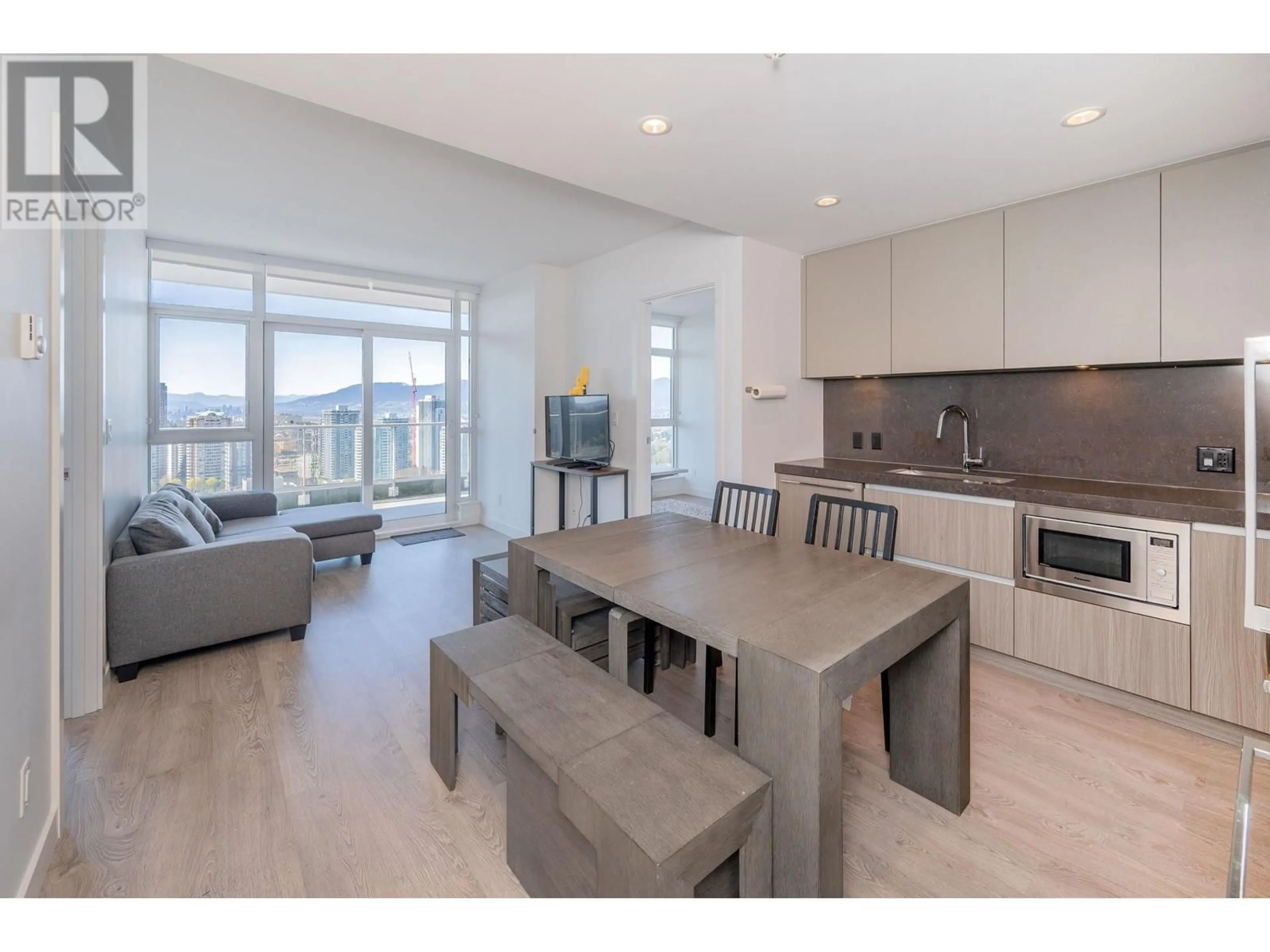 Open concept kitchen, wood/laminate floor for 2503 - 6080 MCKAY AVENUE, Burnaby British Columbia V5H0J4