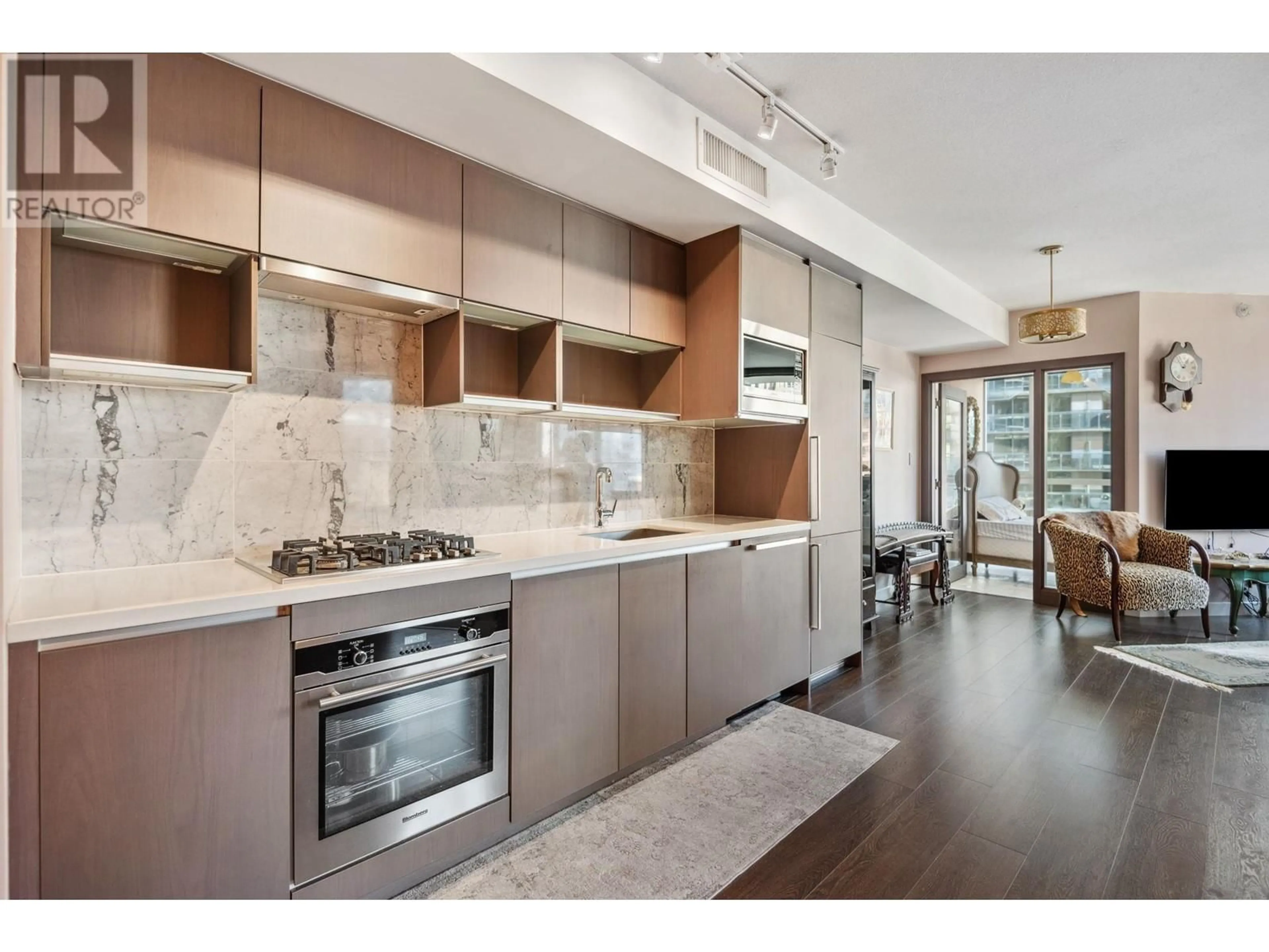 Open concept kitchen, ceramic/tile floor for 620 - 68 SMITHE STREET, Vancouver British Columbia V6B0P4