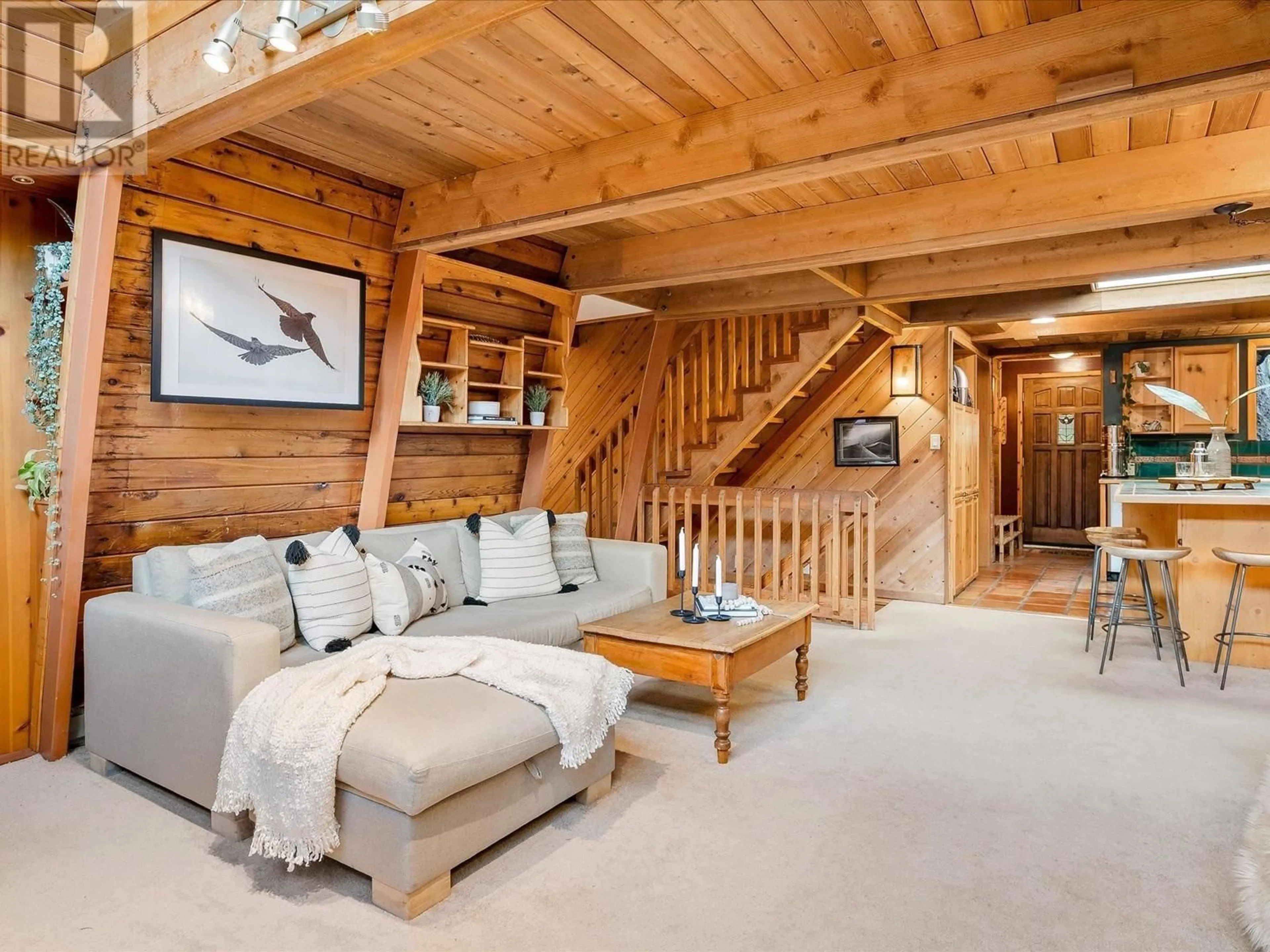 Living room with furniture, wood/laminate floor for 9480 EMERALD DRIVE, Whistler British Columbia V8E0G5