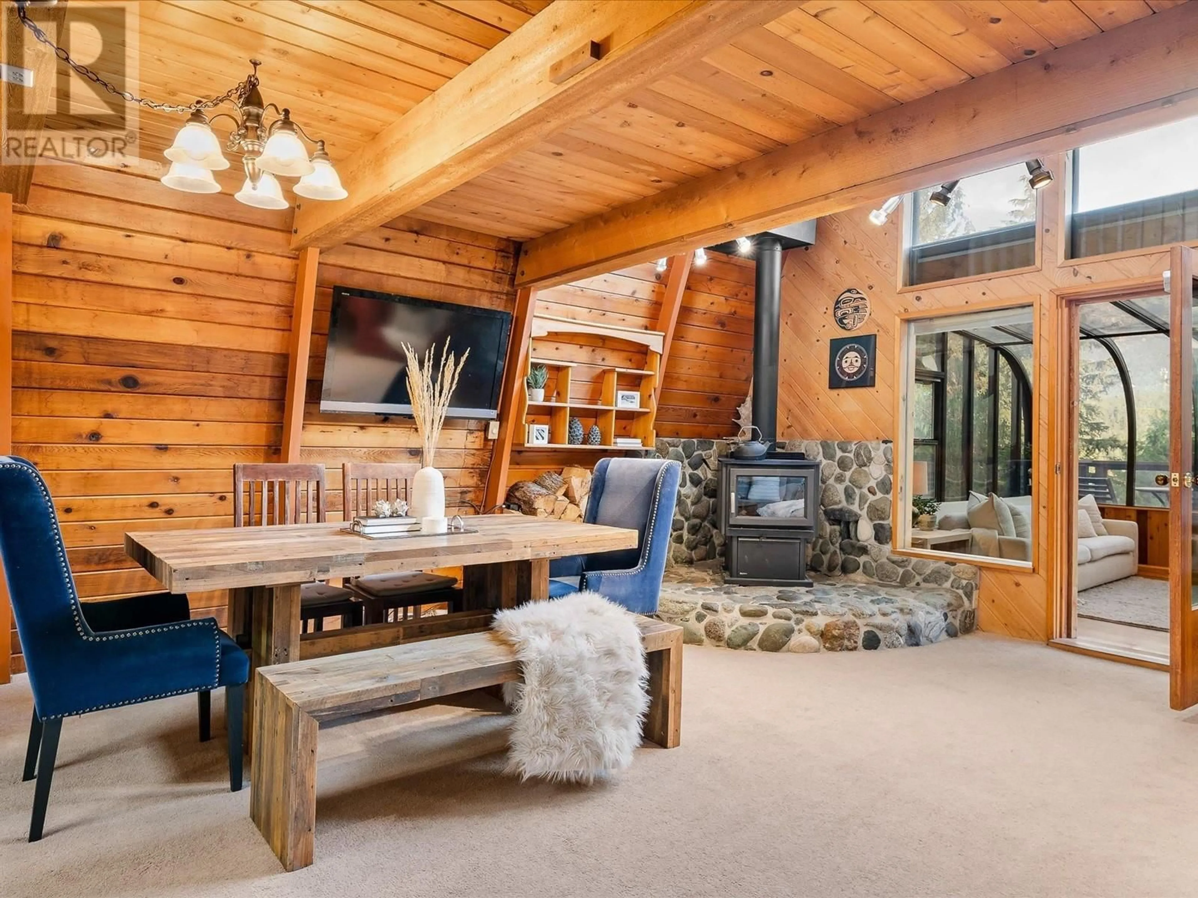 Living room with furniture, wood/laminate floor for 9480 EMERALD DRIVE, Whistler British Columbia V8E0G5