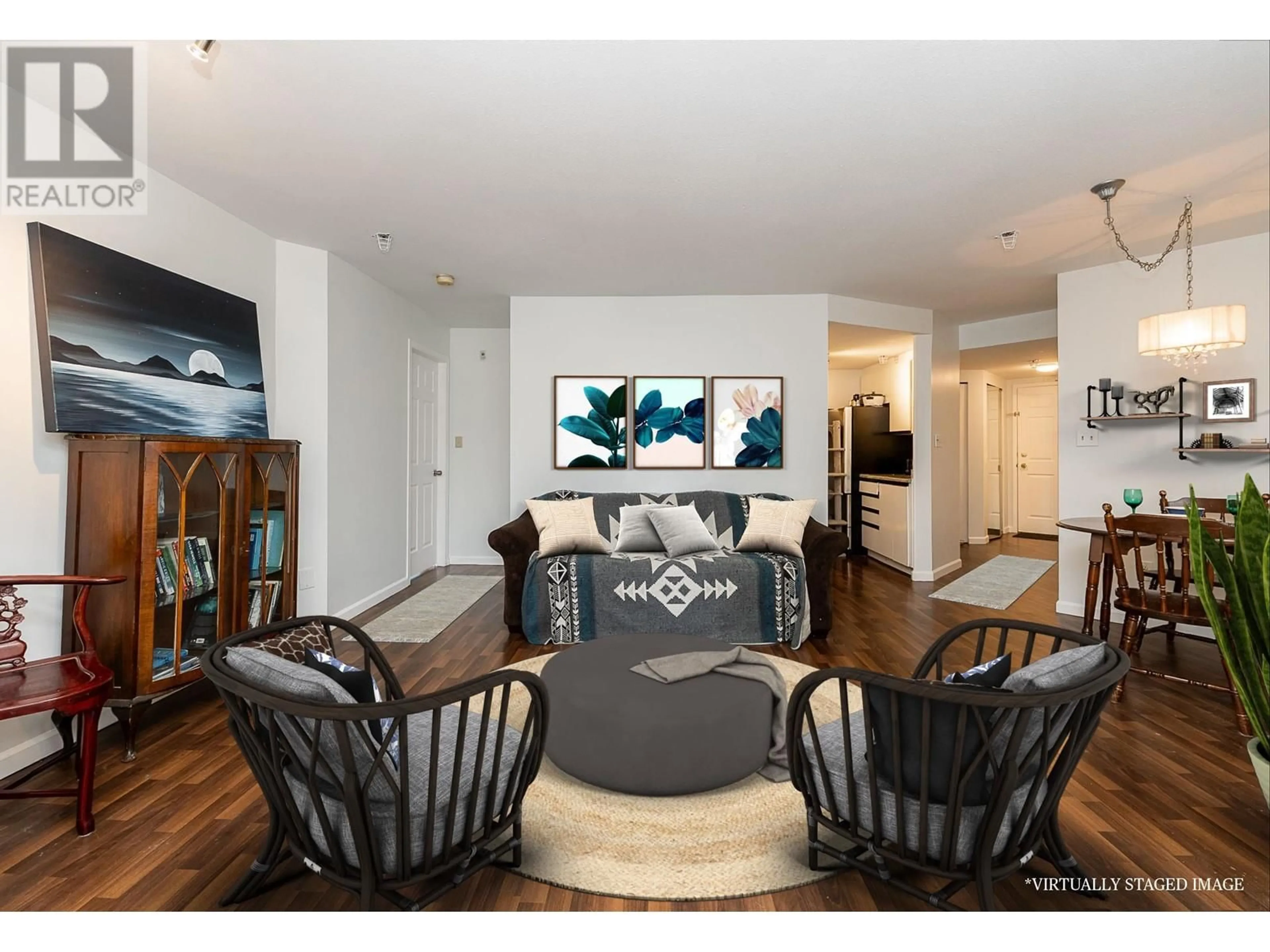 Living room with furniture, wood/laminate floor for 201 - 2023 FRANKLIN STREET, Vancouver British Columbia V5L1R4