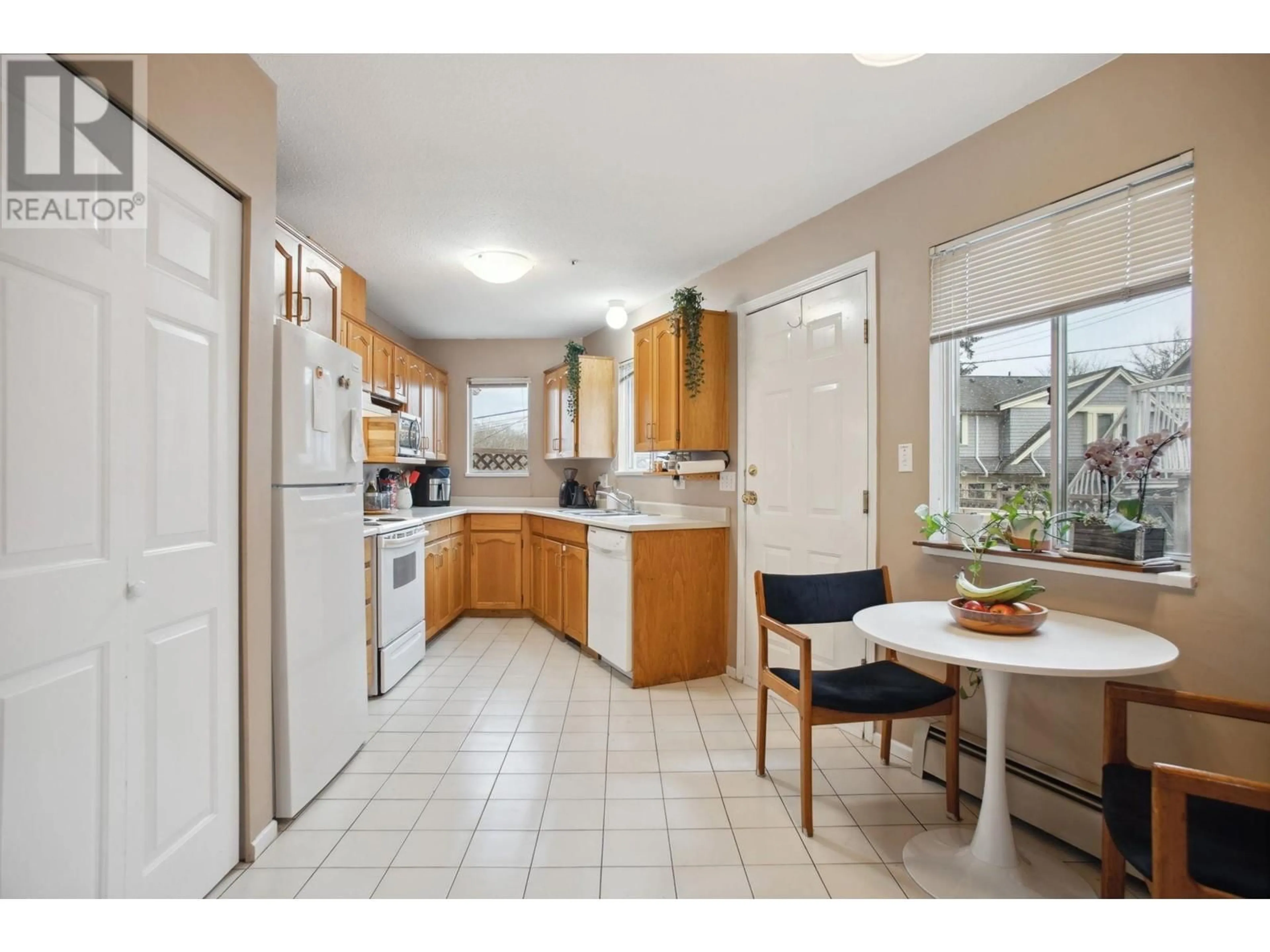 Standard kitchen, ceramic/tile floor for 3738 FRASER STREET, Vancouver British Columbia V5V4E1