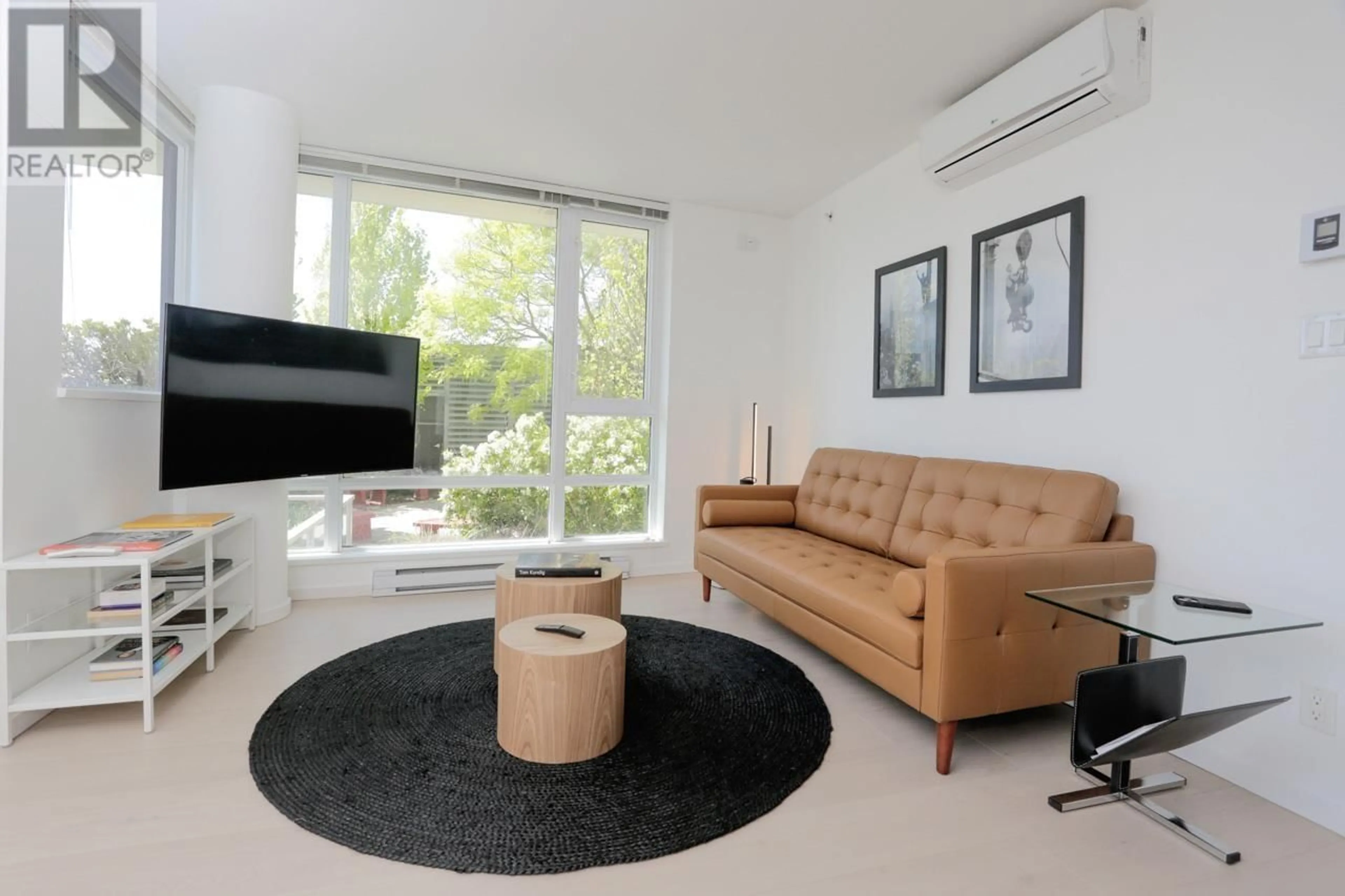 Living room with furniture, unknown for 708 - 7733 FIRBRIDGE WAY, Richmond British Columbia V6X0M7
