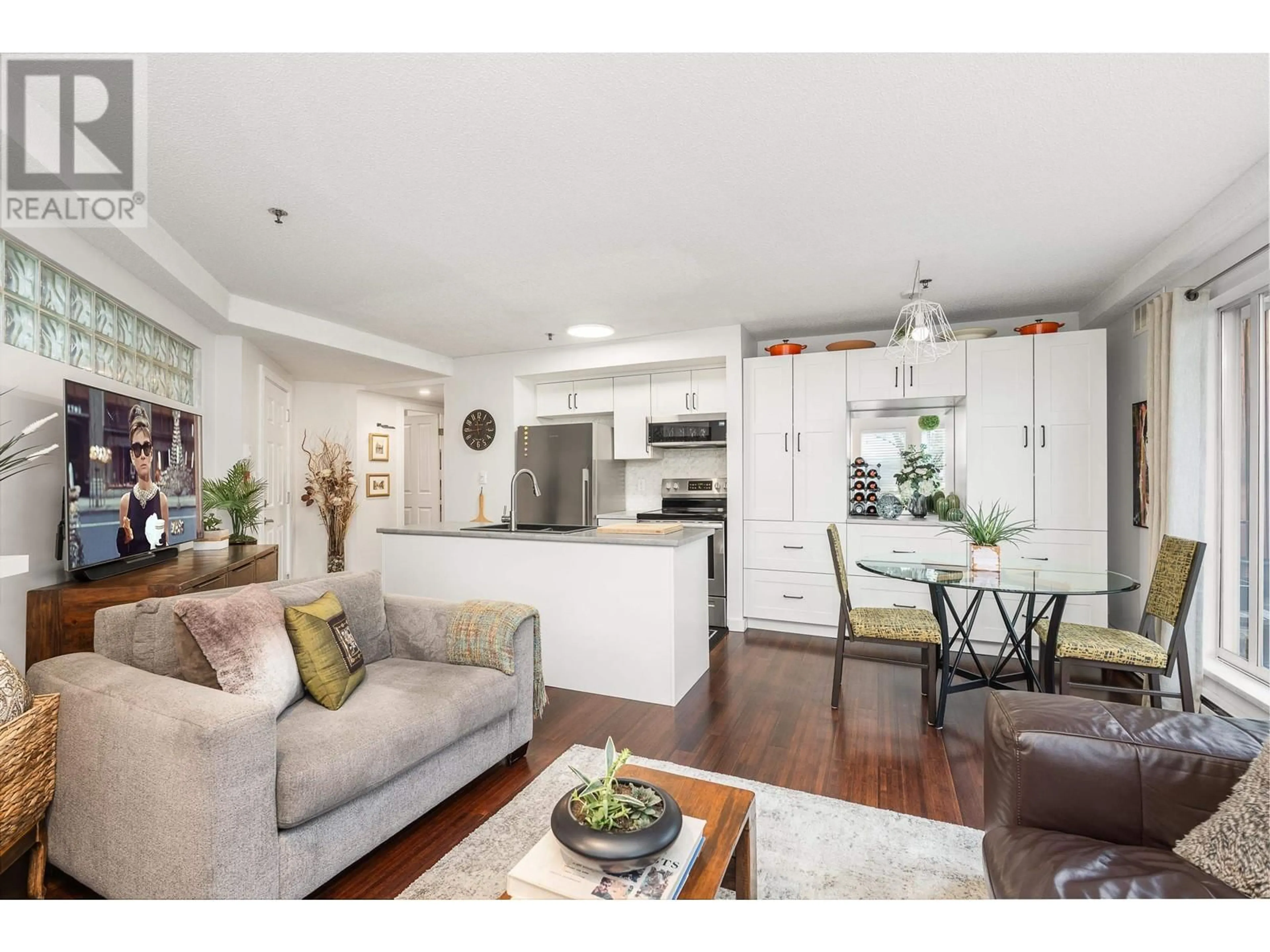 Open concept kitchen, wood/laminate floor for 104 - 1988 MAPLE STREET, Vancouver British Columbia V6J3T1