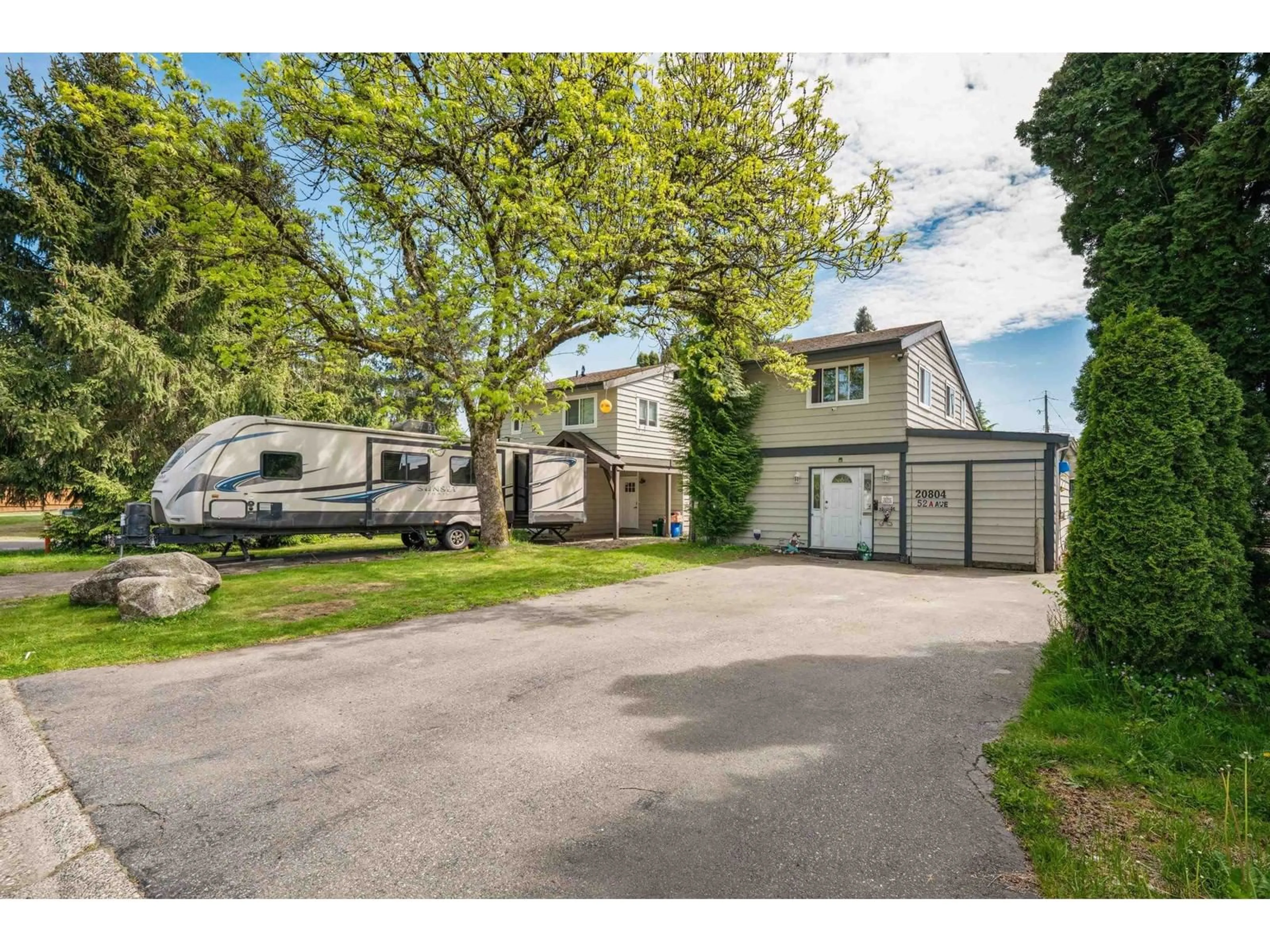 A pic from outside/outdoor area/front of a property/back of a property/a pic from drone, street for 20804 52A, Langley British Columbia V3A6E5