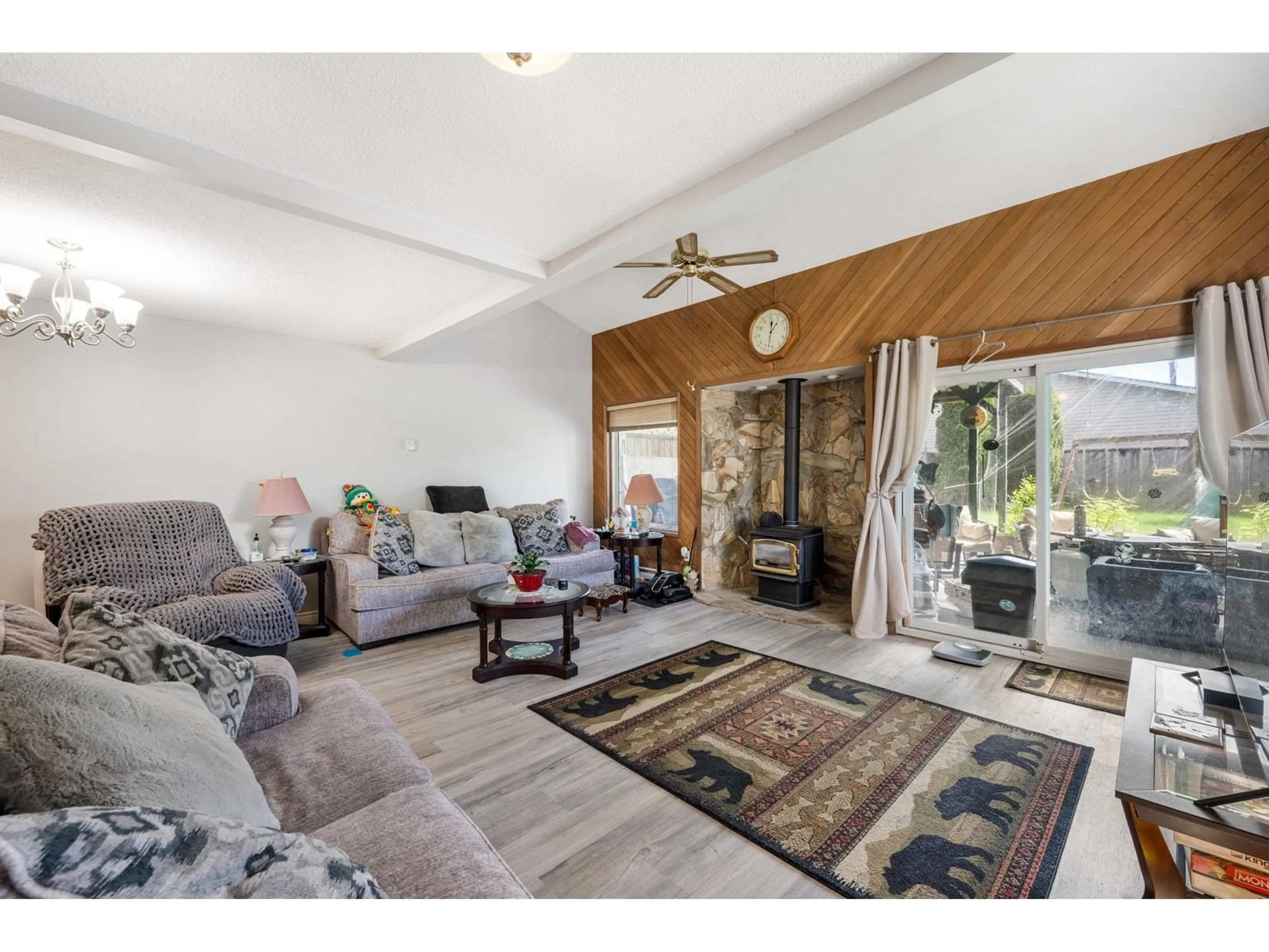 Living room with furniture, wood/laminate floor for 20804 52A, Langley British Columbia V3A6E5