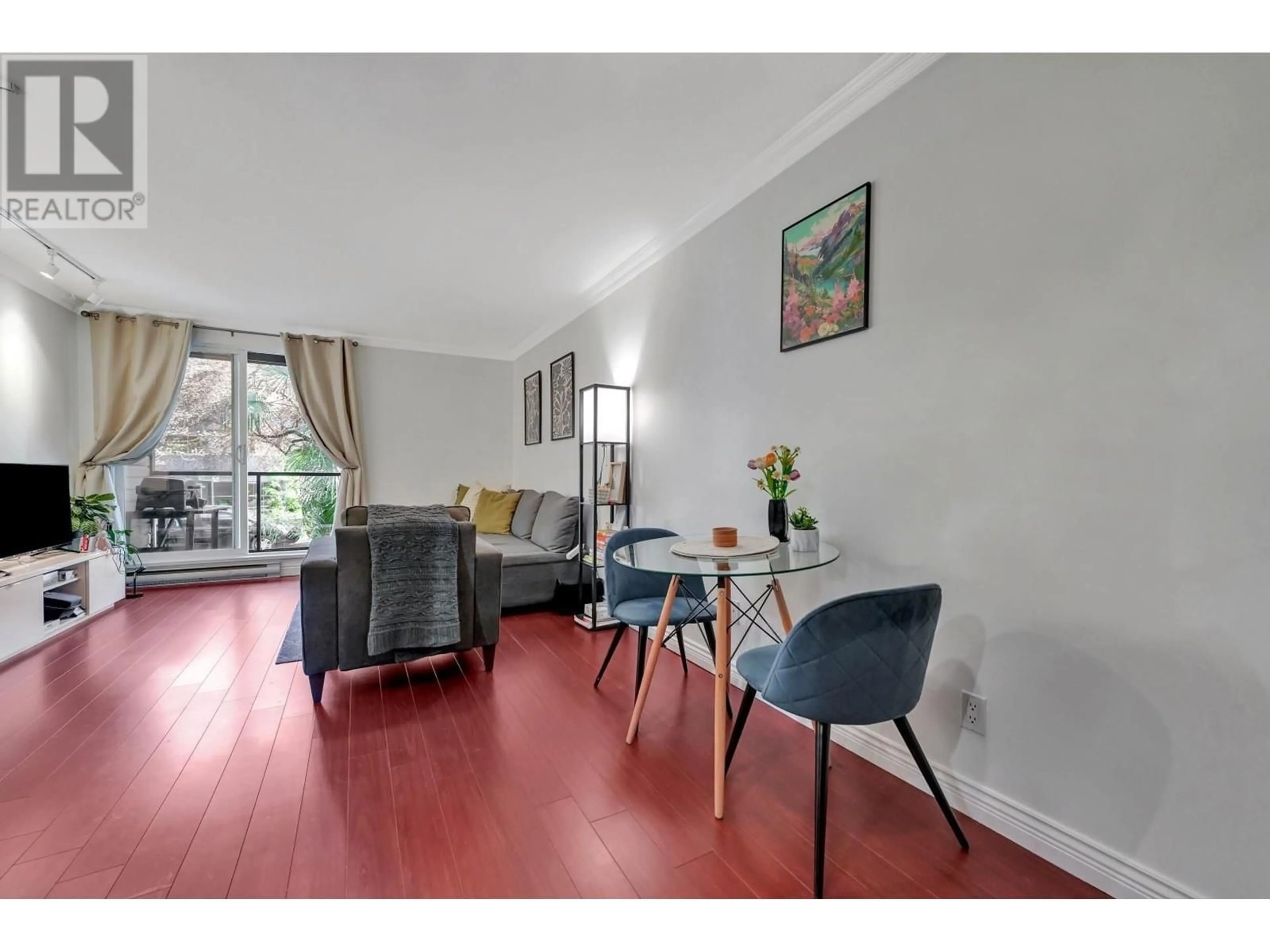 Living room with furniture, wood/laminate floor for 212 - 1550 BARCLAY STREET, Vancouver British Columbia V6G3B1