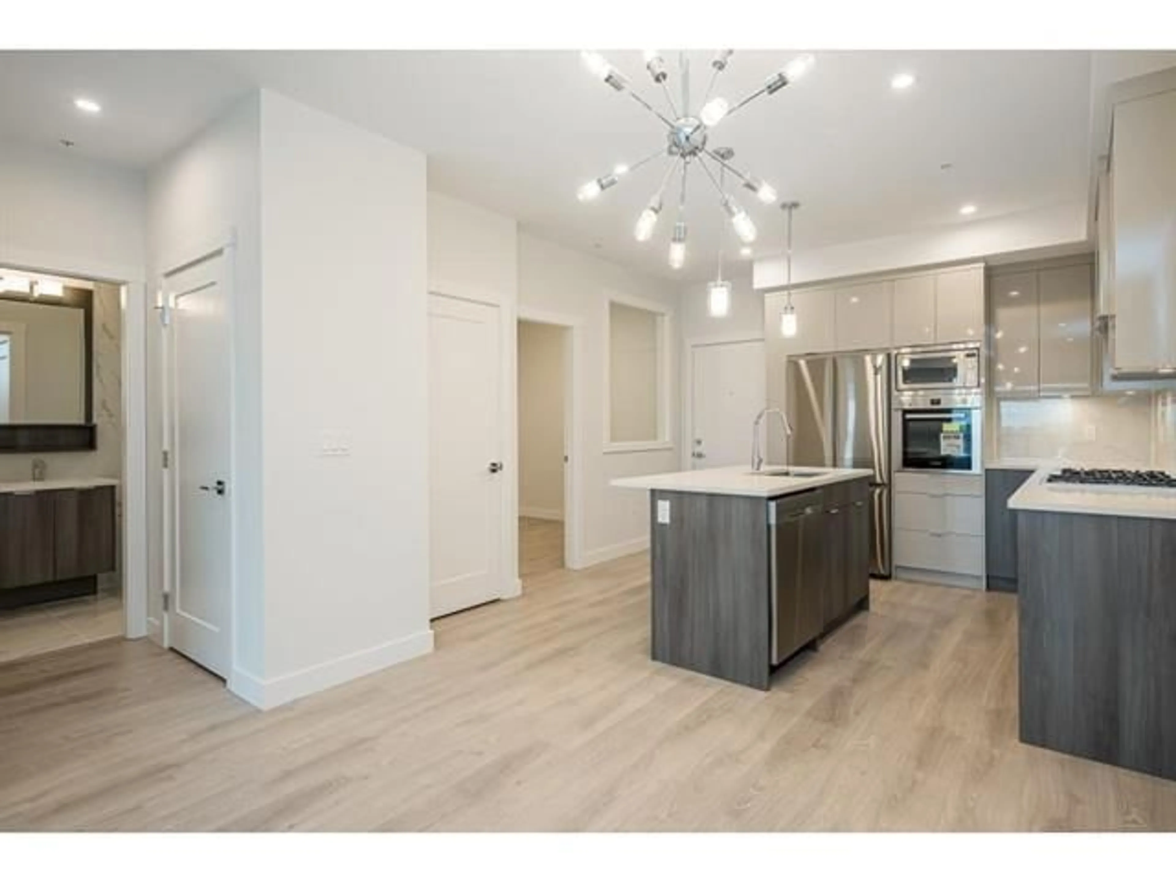 Open concept kitchen, unknown for A403 - 14468 72, Surrey British Columbia V3S0B6