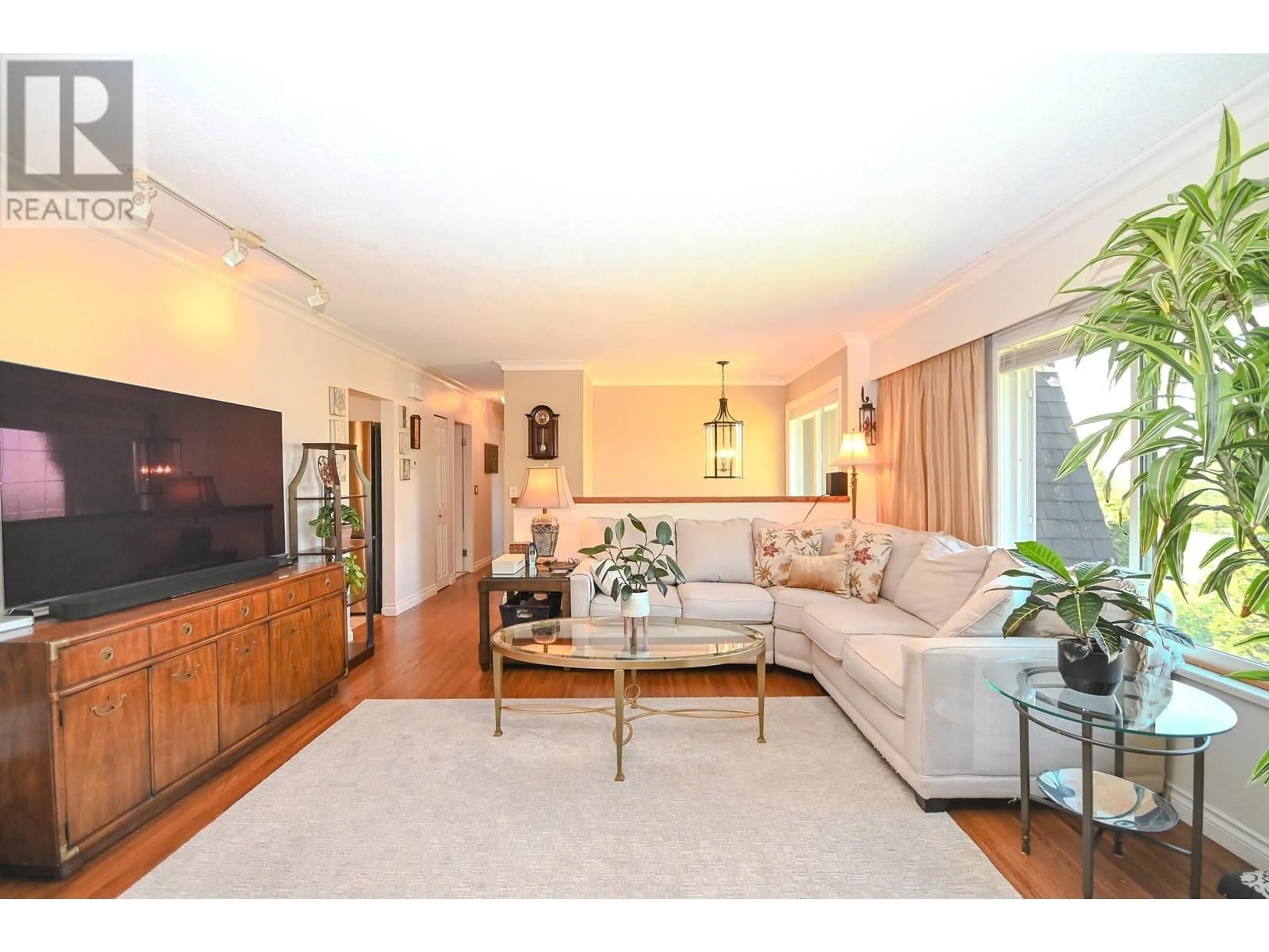 Living room with furniture, wood/laminate floor for 1548 ELINOR CRESCENT, Port Coquitlam British Columbia V3C2Y9