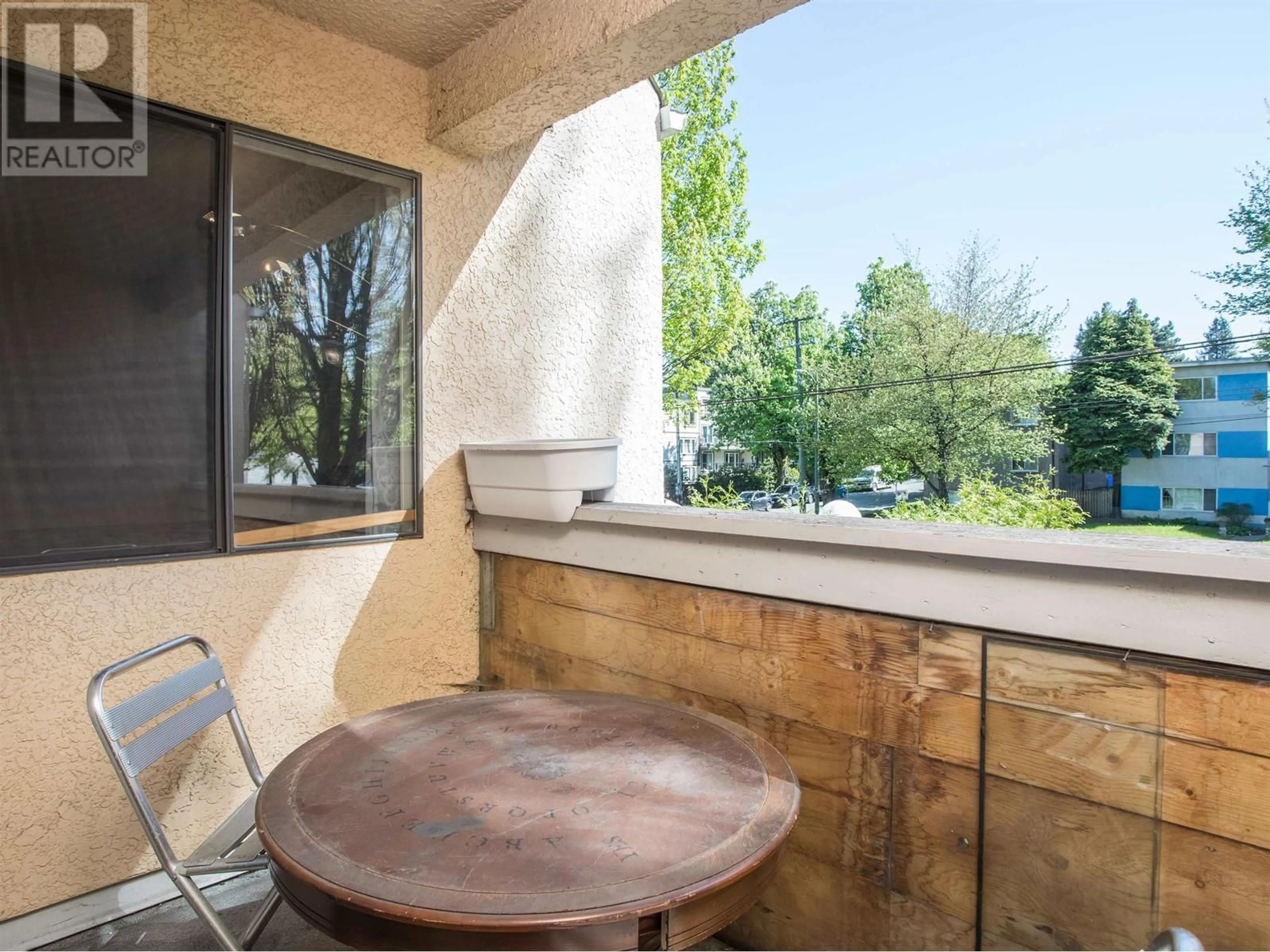 Patio, water/lake/river/ocean view for 313 - 975 BROADWAY, Vancouver British Columbia V5T1Y3