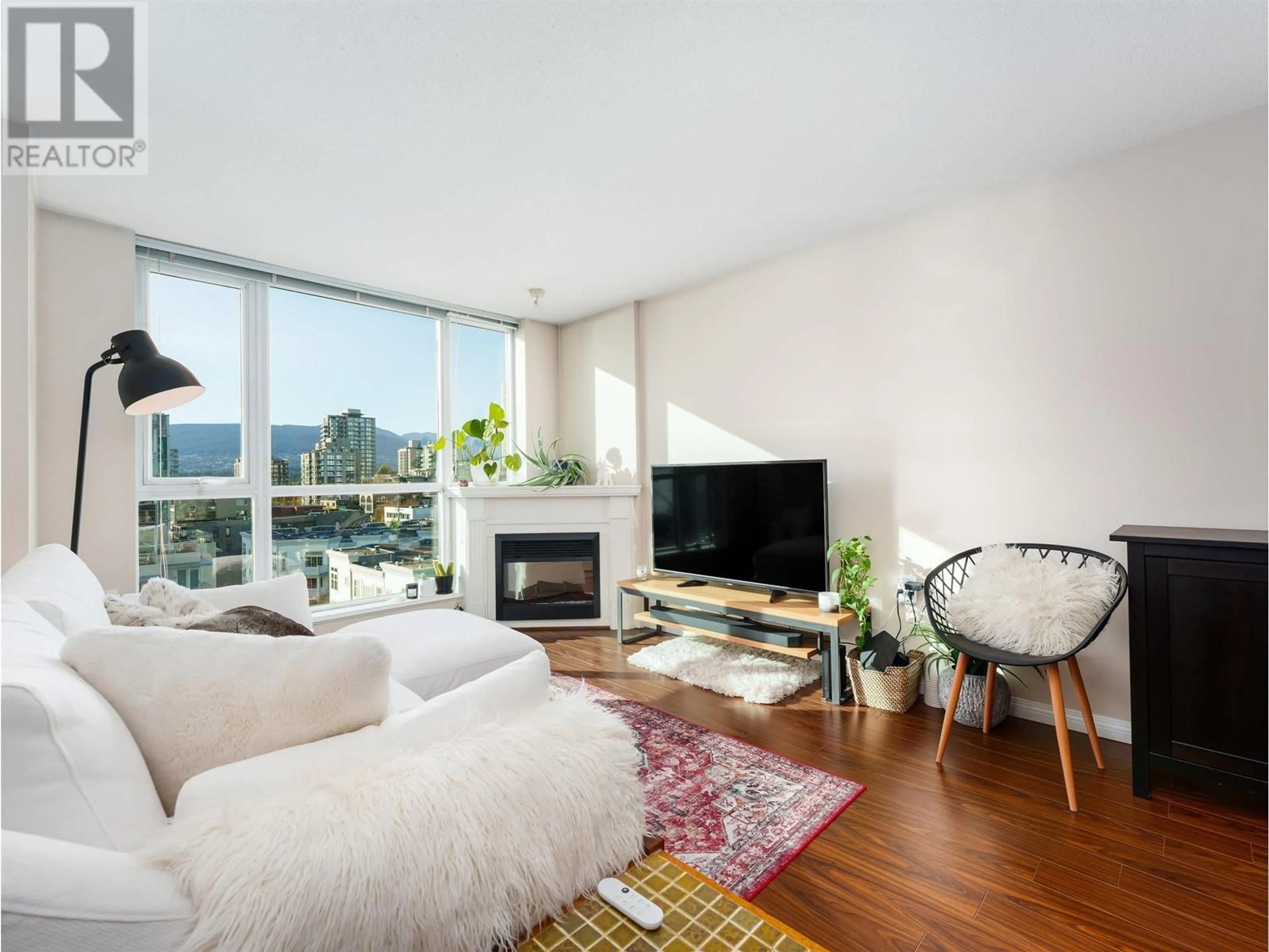 Living room with furniture, wood/laminate floor for 1107 - 188 ESPLANADE, North Vancouver British Columbia V7L4Y1
