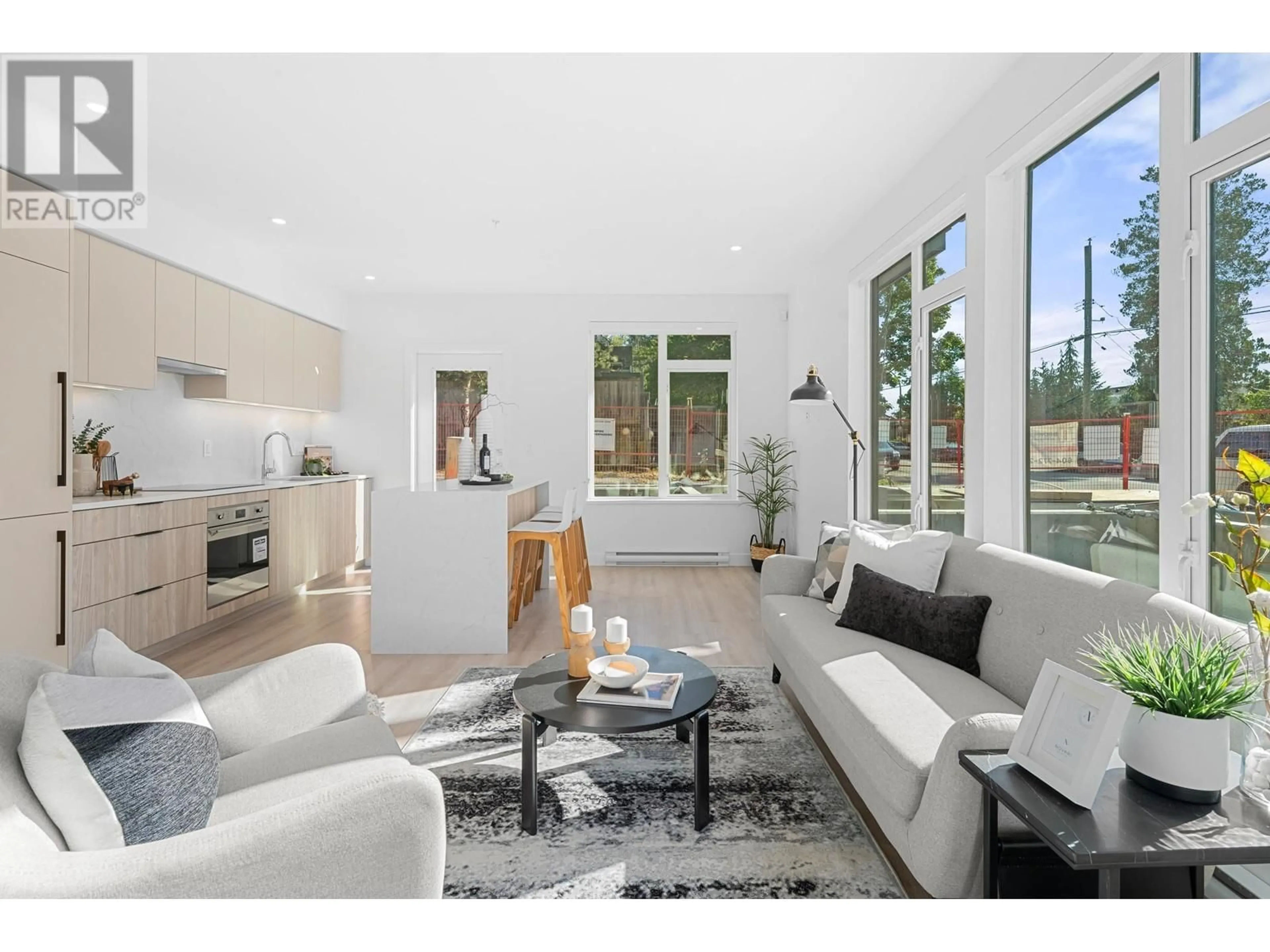 Living room with furniture, unknown for 107 - 7161 17TH AVENUE, Burnaby British Columbia V3N0K1