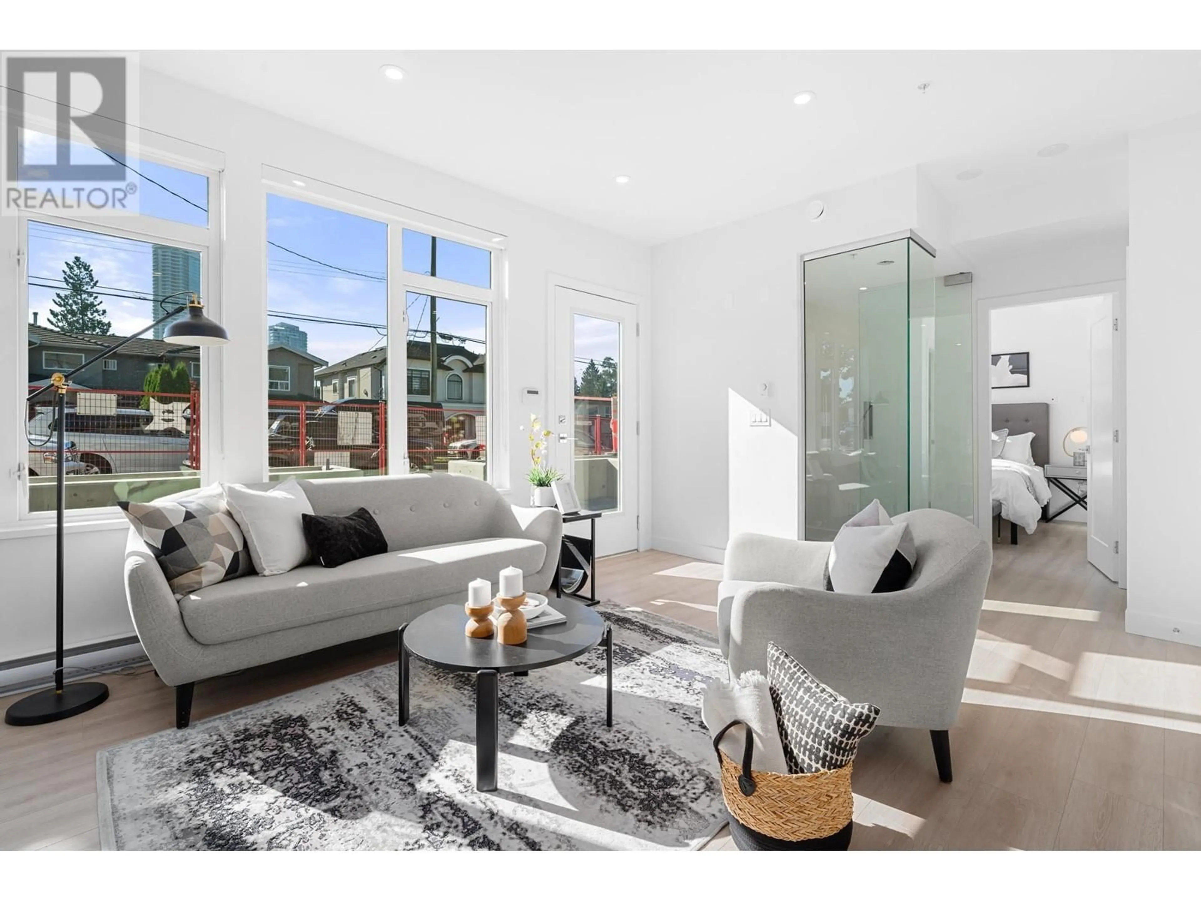 Living room with furniture, unknown for 107 - 7161 17TH AVENUE, Burnaby British Columbia V3N0K1