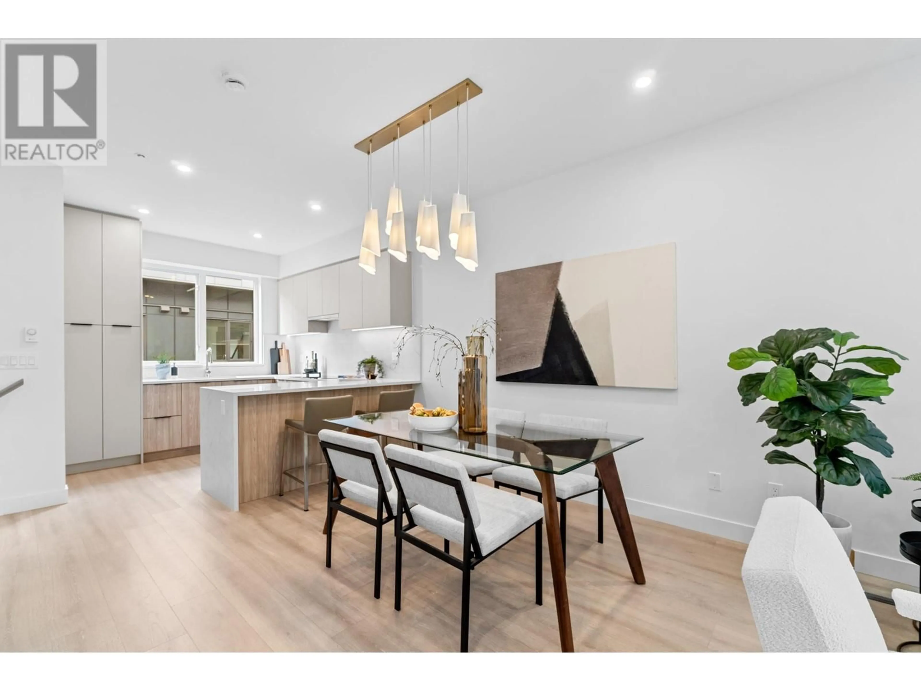 Open concept kitchen, wood/laminate floor for 205 - 7161 17TH AVENUE, Burnaby British Columbia V3N0K1