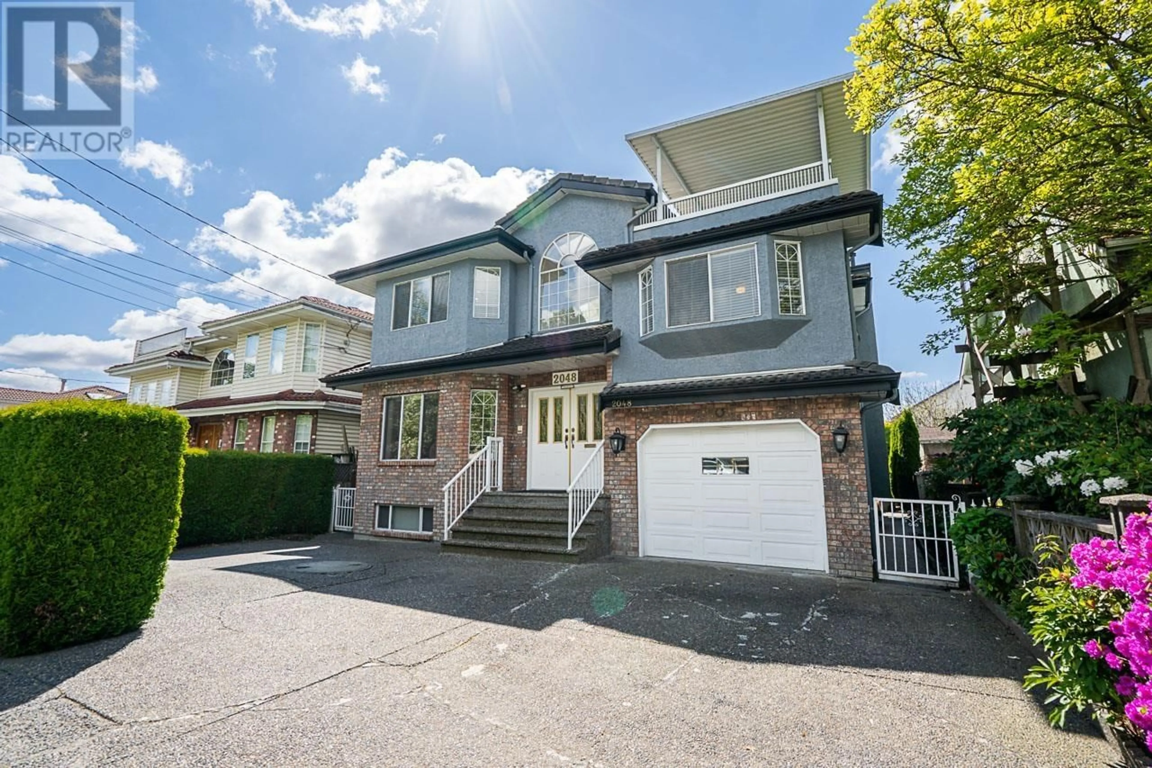 Home with brick exterior material, street for 2048 34TH AVENUE, Vancouver British Columbia V5P1A8
