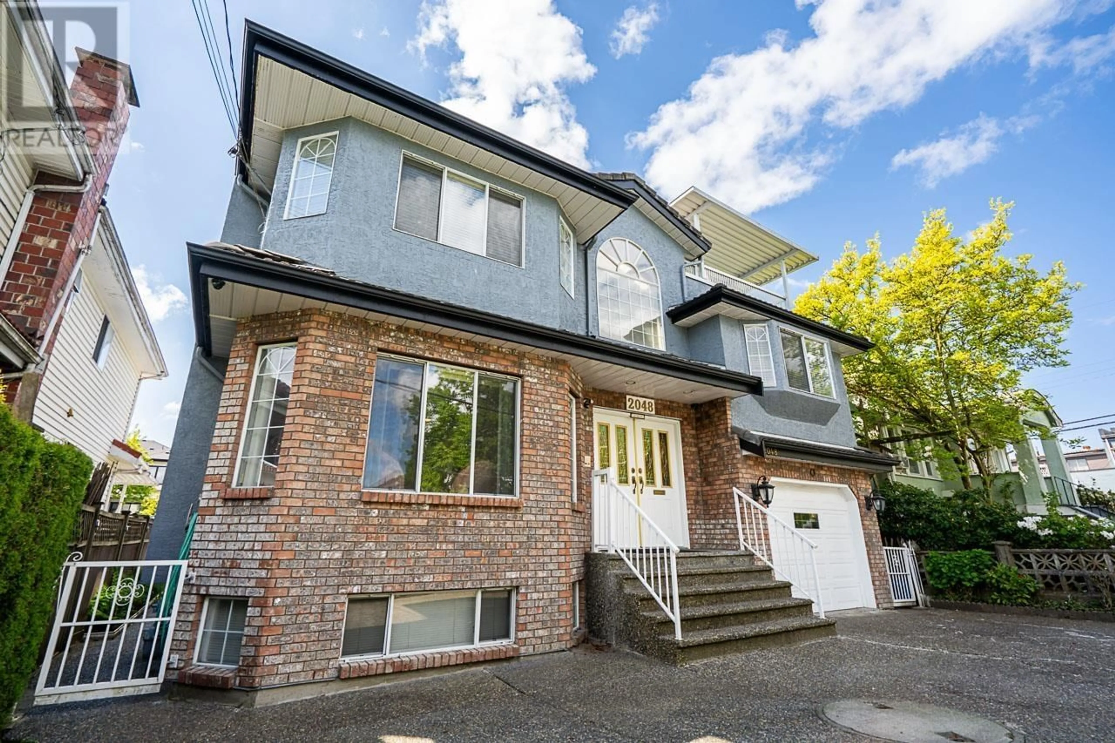 Home with brick exterior material, street for 2048 34TH AVENUE, Vancouver British Columbia V5P1A8