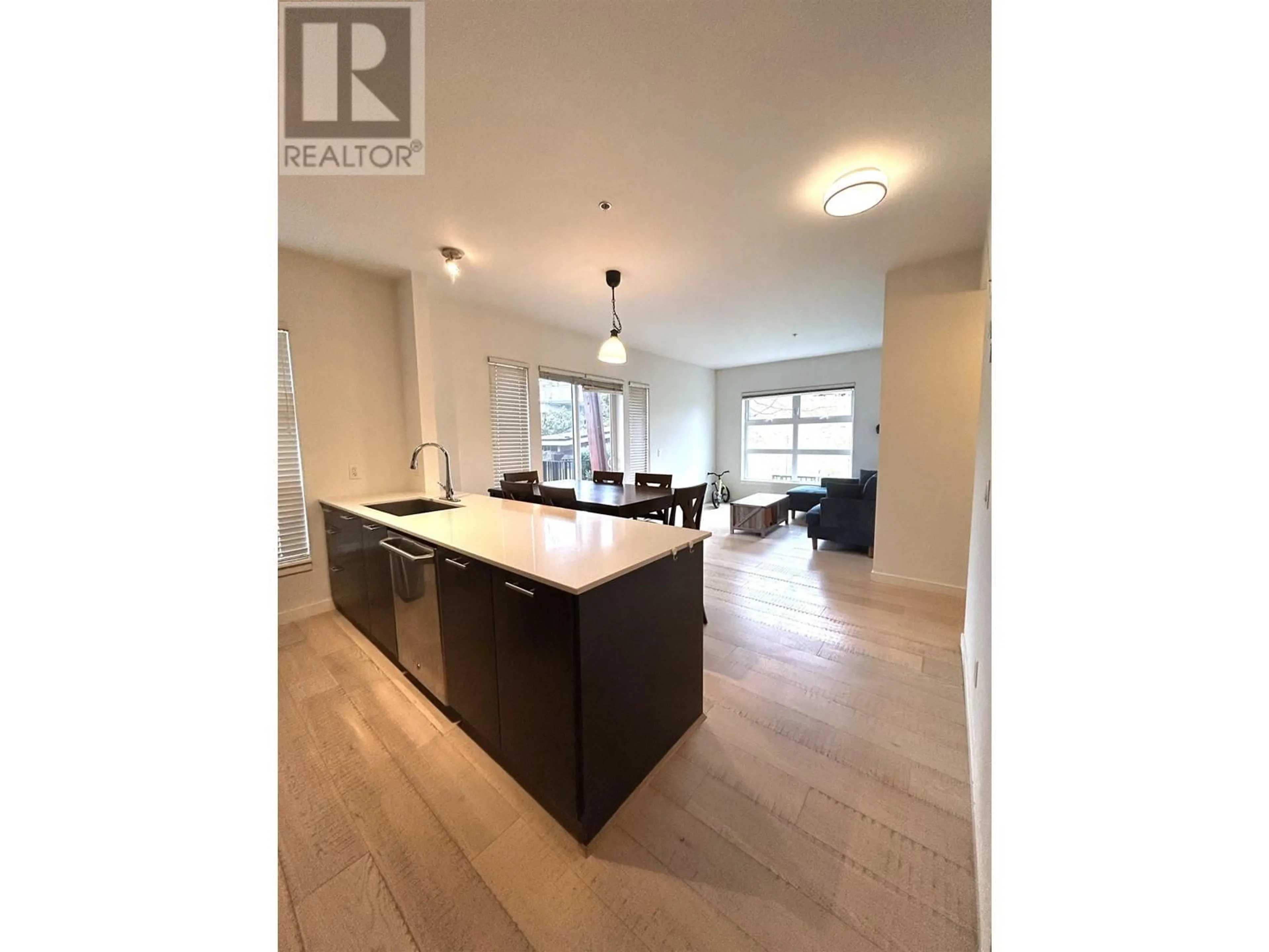 Open concept kitchen, wood/laminate floor for 105 - 245 BROOKES STREET, New Westminster British Columbia V3M0G5