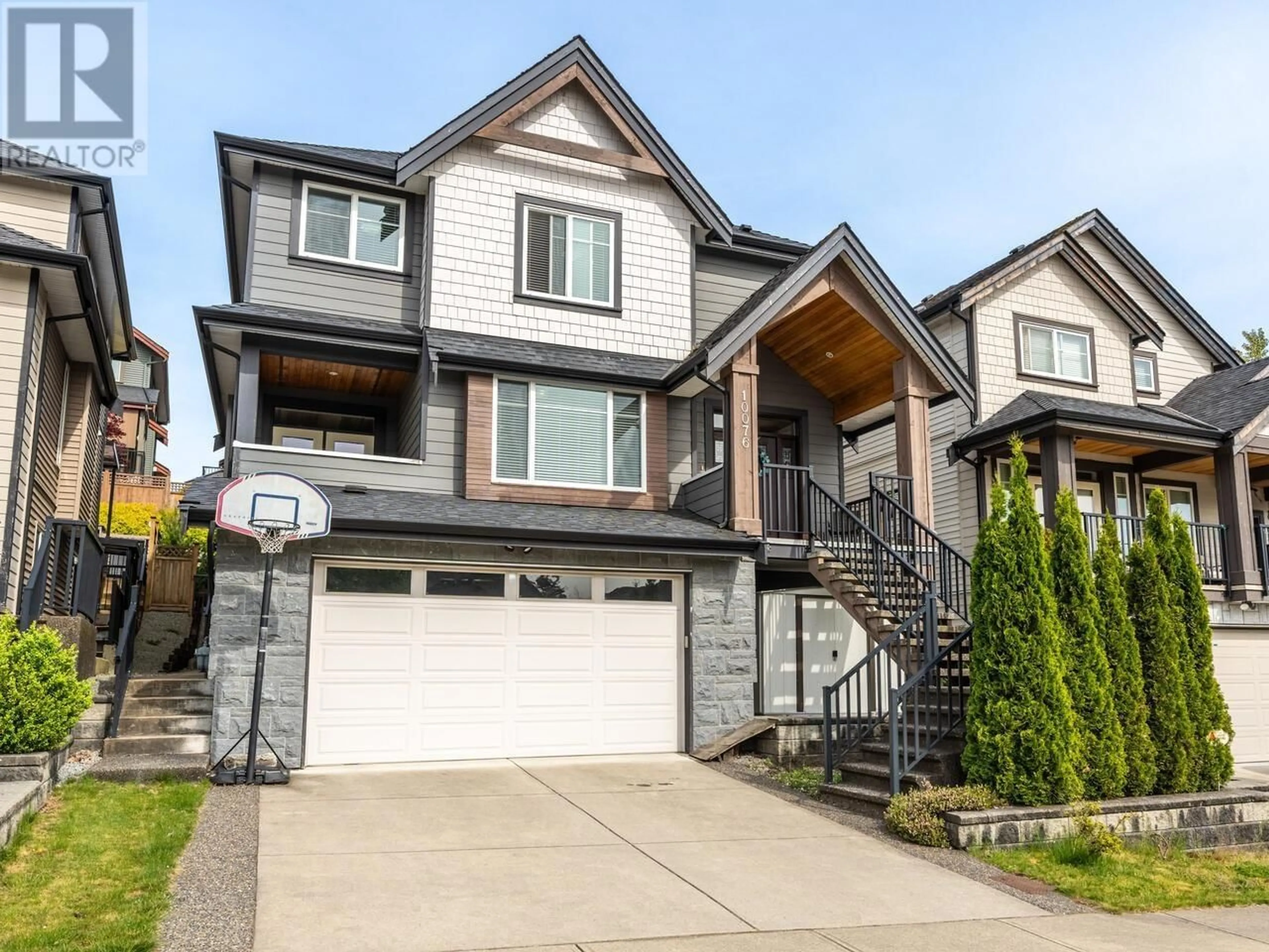 Home with vinyl exterior material, street for 10076 247 STREET, Maple Ridge British Columbia V2W0H1