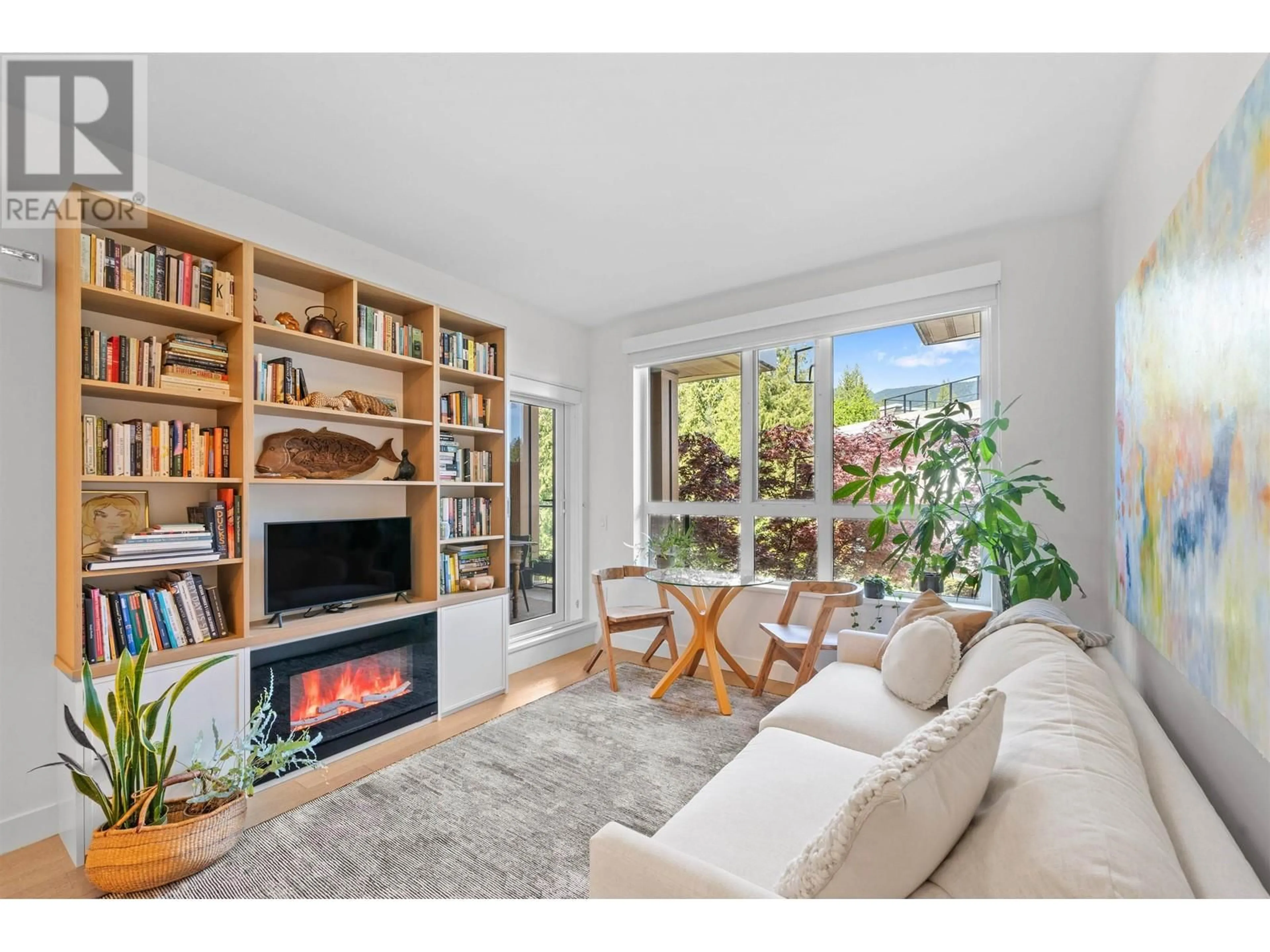 Living room with furniture, unknown for 321 - 3220 CONNAUGHT CRESCENT, North Vancouver British Columbia V7R0A5