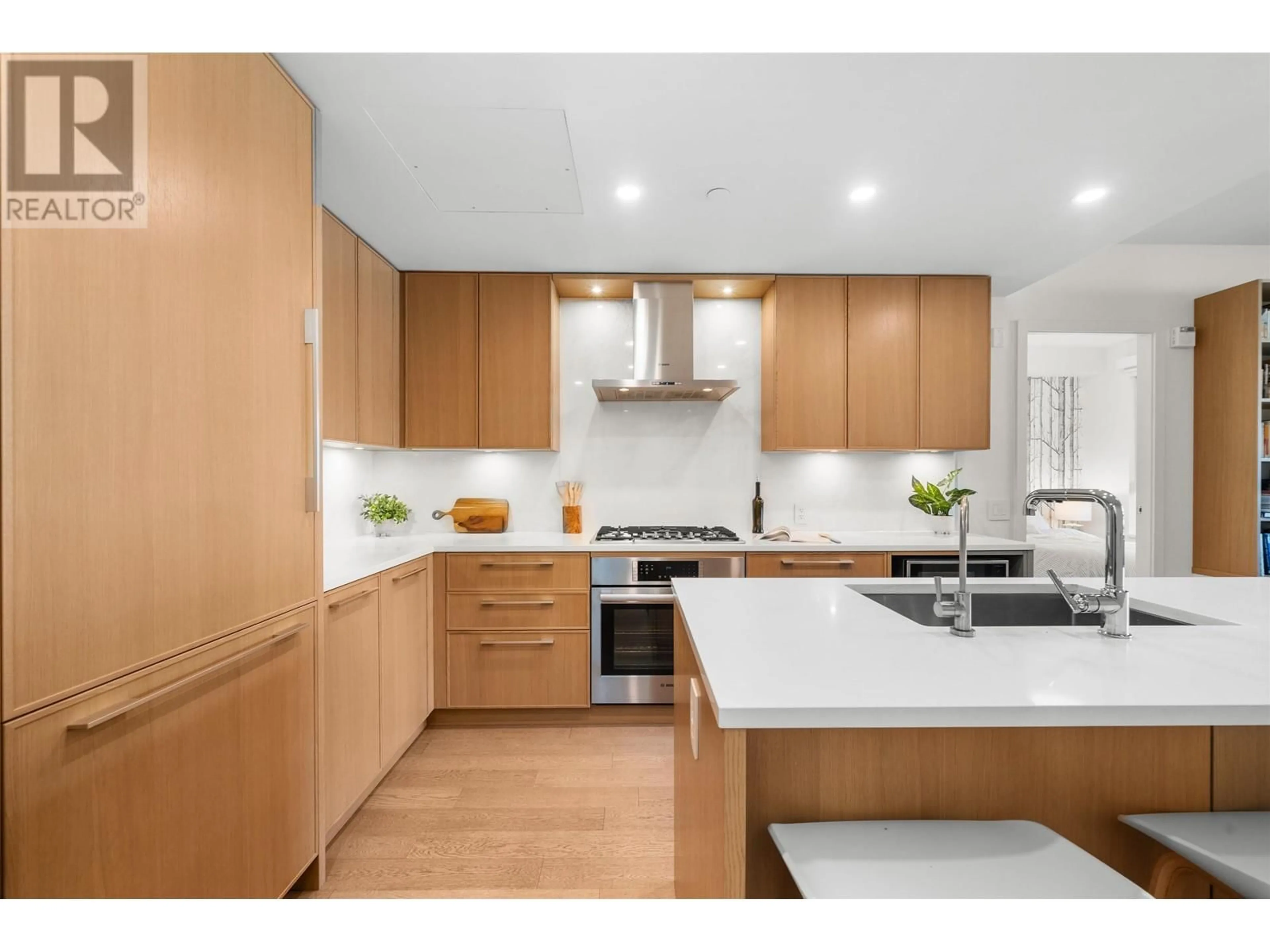 Contemporary kitchen, unknown for 321 - 3220 CONNAUGHT CRESCENT, North Vancouver British Columbia V7R0A5