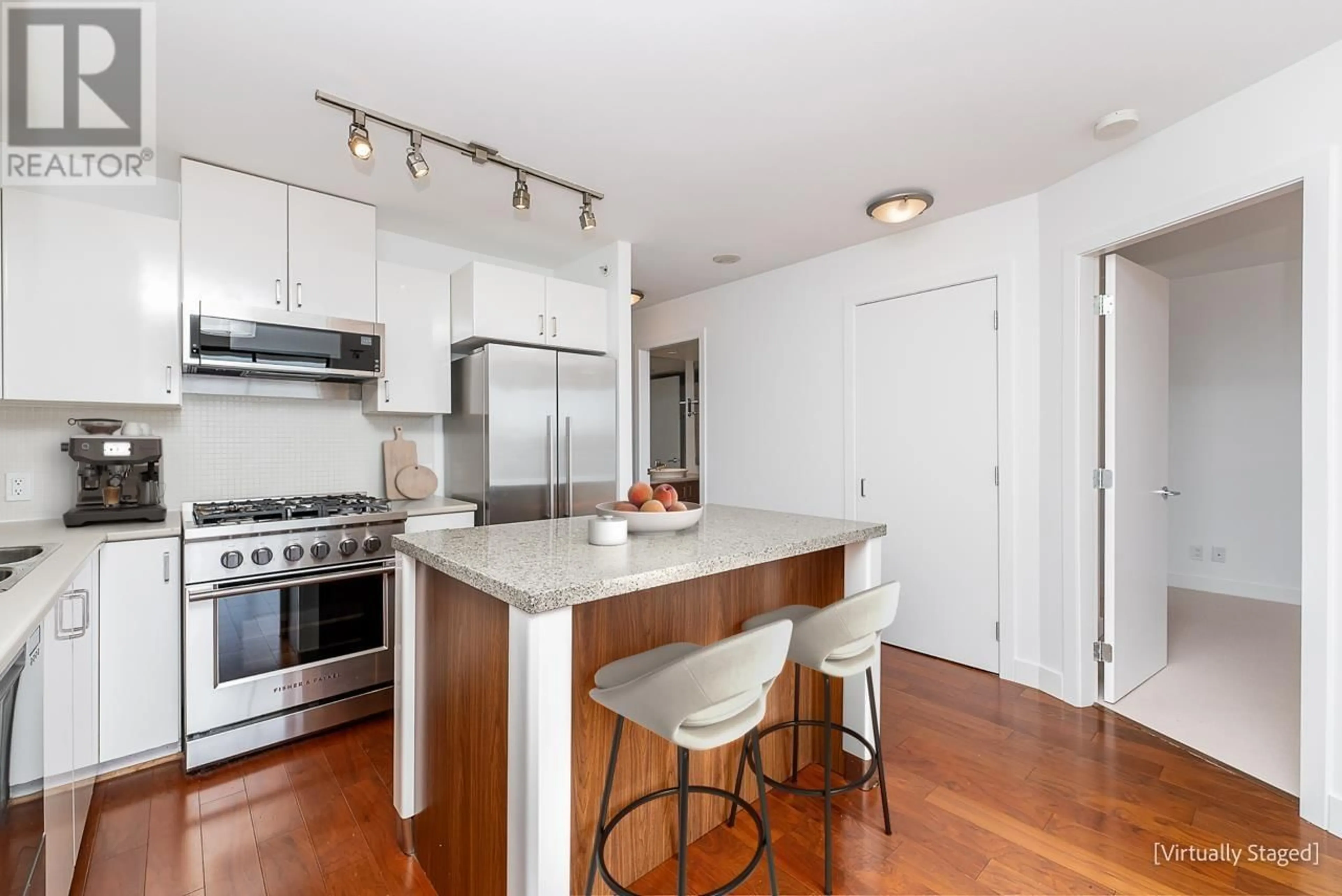 Open concept kitchen, wood/laminate floor for 1211 - 175 1ST STREET, North Vancouver British Columbia V7M3N9