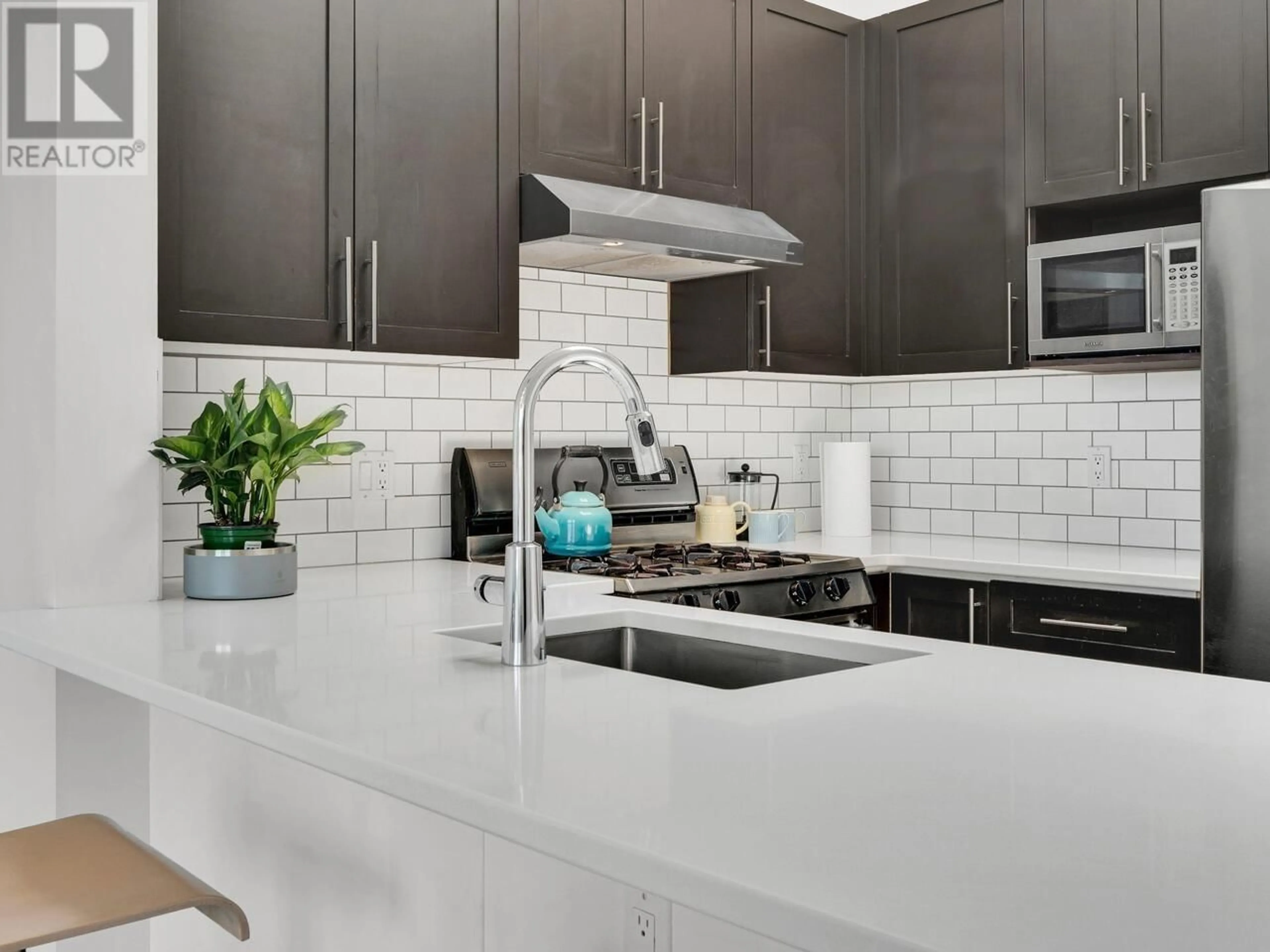 Contemporary kitchen, ceramic/tile floor for 406 - 1858 5TH AVENUE, Vancouver British Columbia V6J1P3