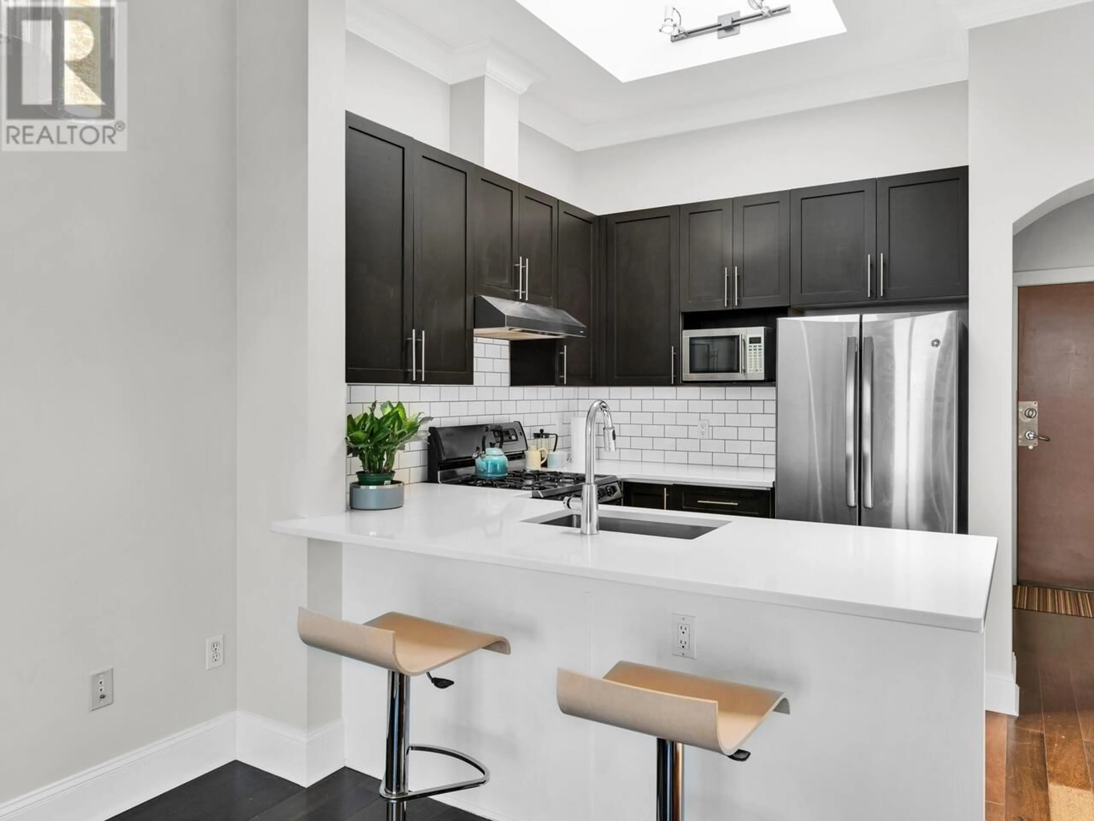 Contemporary kitchen, ceramic/tile floor for 406 - 1858 5TH AVENUE, Vancouver British Columbia V6J1P3