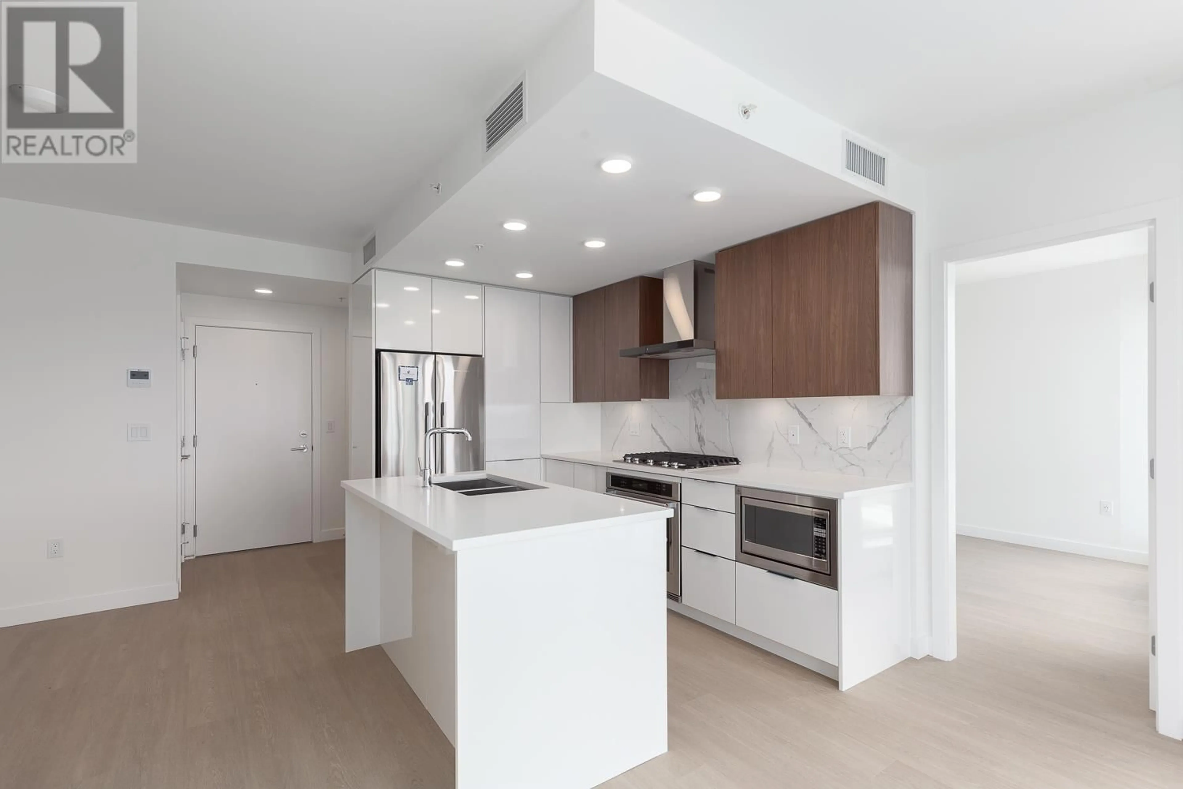 Open concept kitchen, ceramic/tile floor for 2507 - 7769 PARK CRESCENT, Burnaby British Columbia V3N0J7
