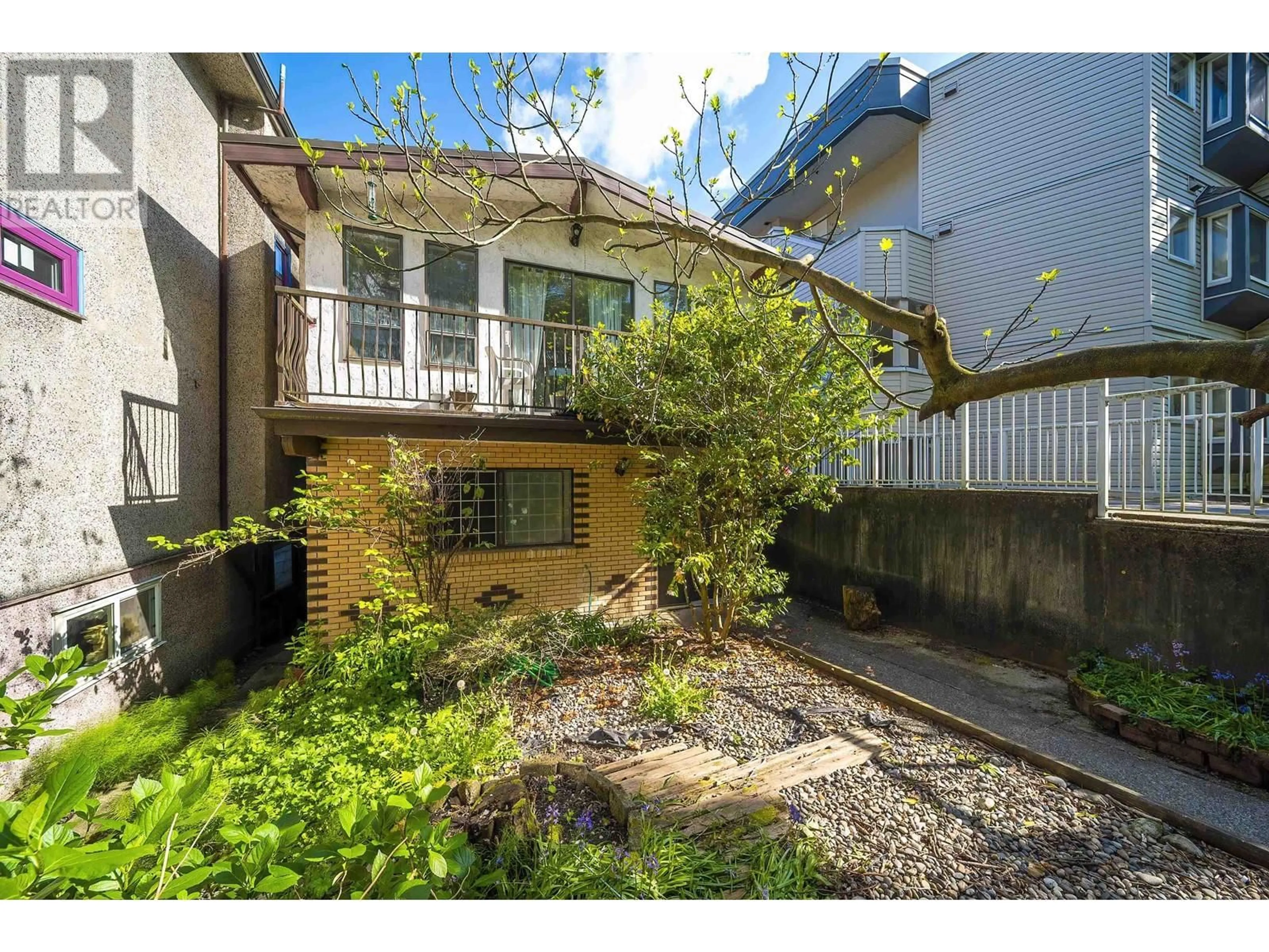 A pic from outside/outdoor area/front of a property/back of a property/a pic from drone, street for 2275 PANDORA STREET, Vancouver British Columbia V5L1N6