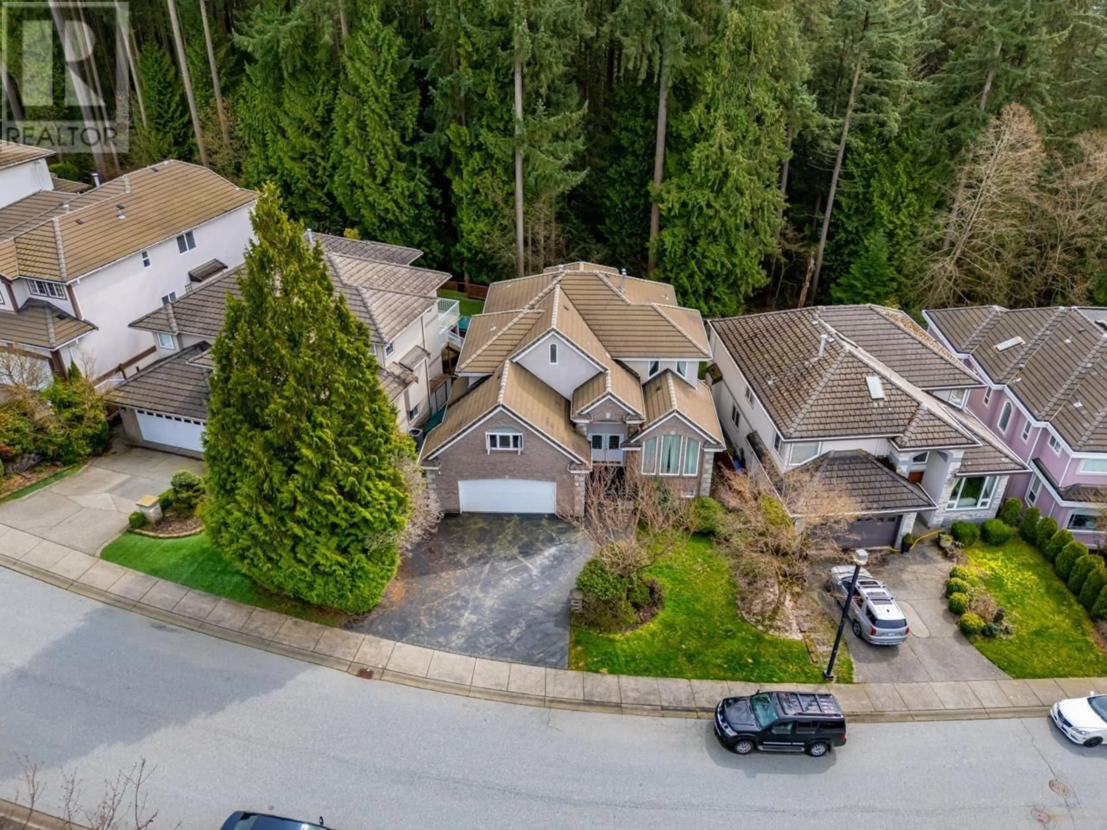 A pic from outside/outdoor area/front of a property/back of a property/a pic from drone, street for 21 WILKES CREEK DRIVE, Port Moody British Columbia V3H5A1