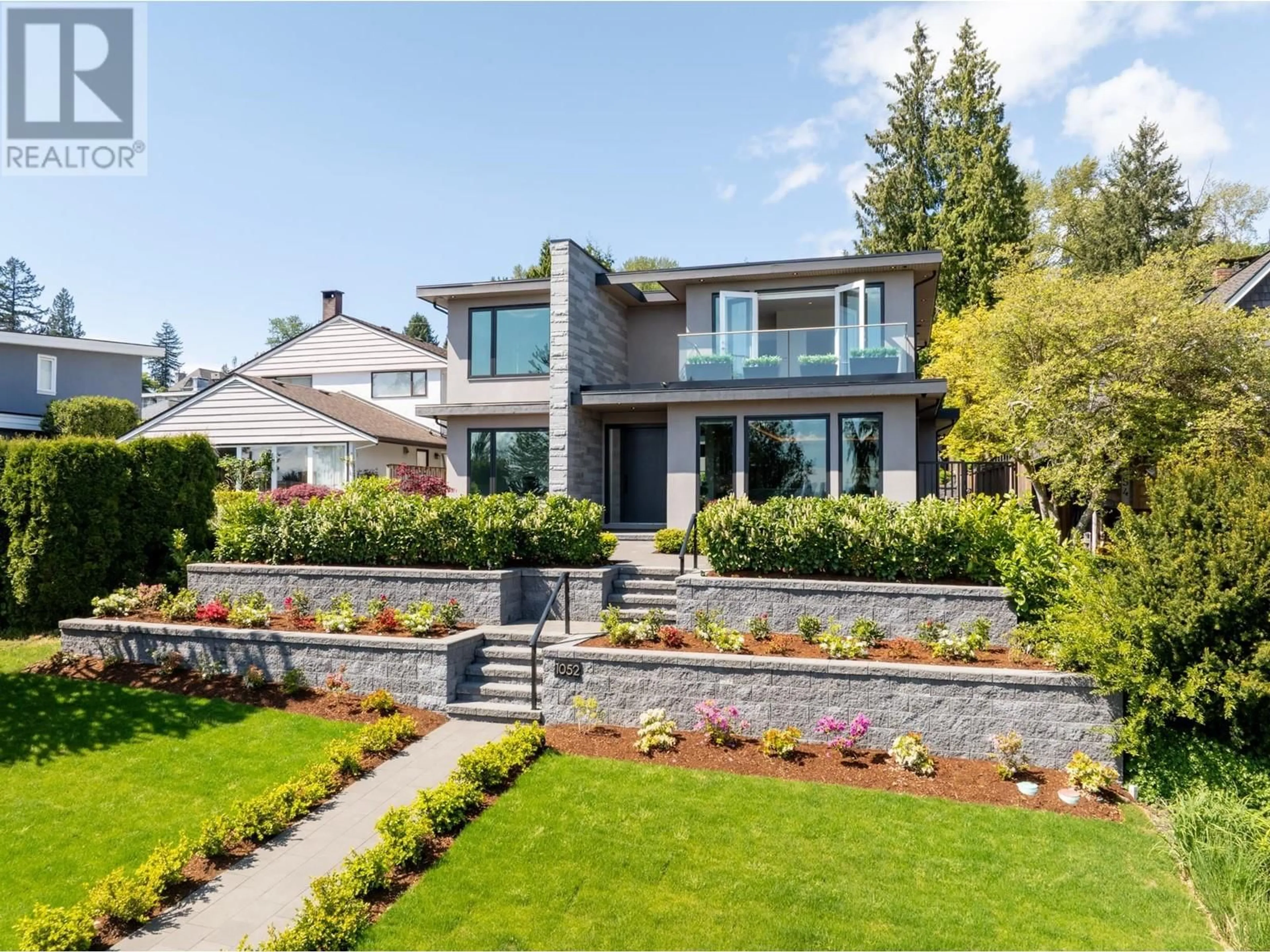 Home with brick exterior material, street for 1052 CALVERHALL STREET, North Vancouver British Columbia V7L1Y3