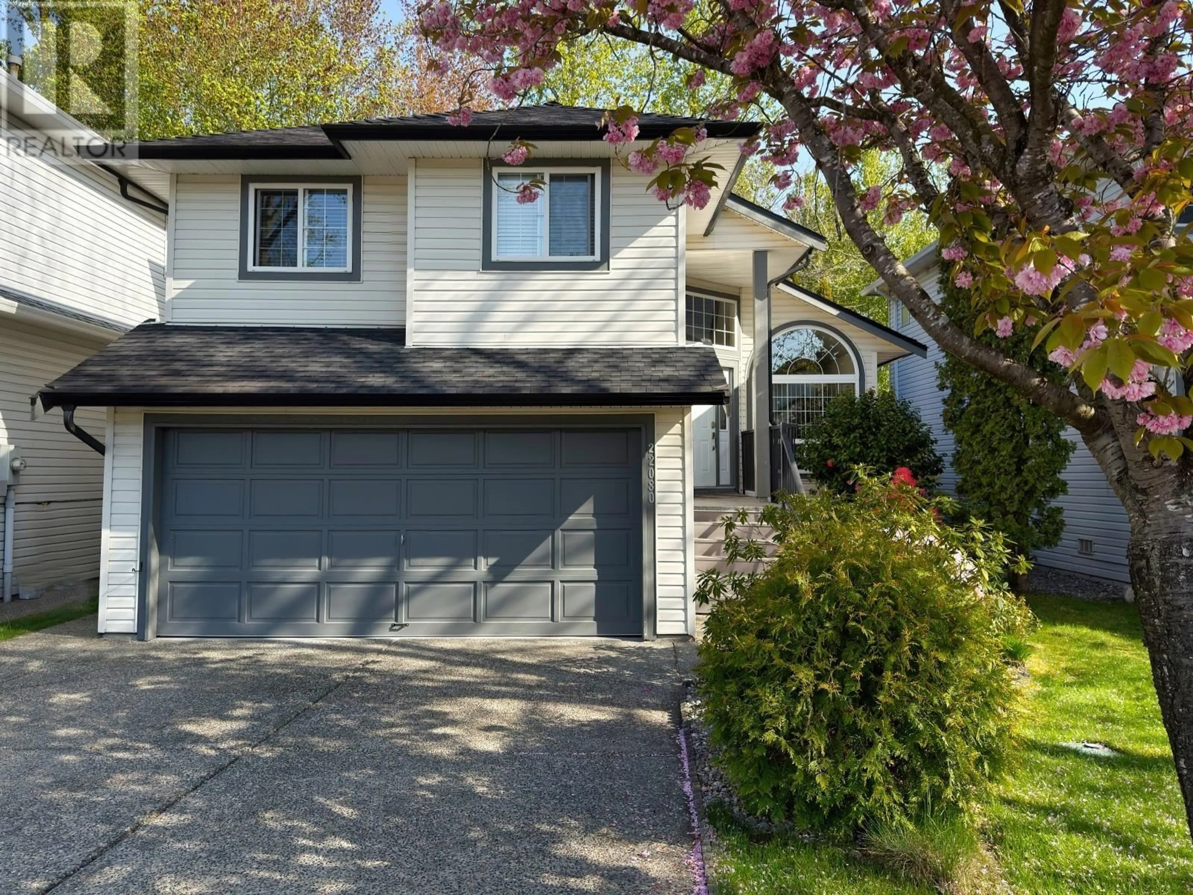 Home with vinyl exterior material, street for 22080 CHALDECOTT DRIVE, Richmond British Columbia V6V2S8