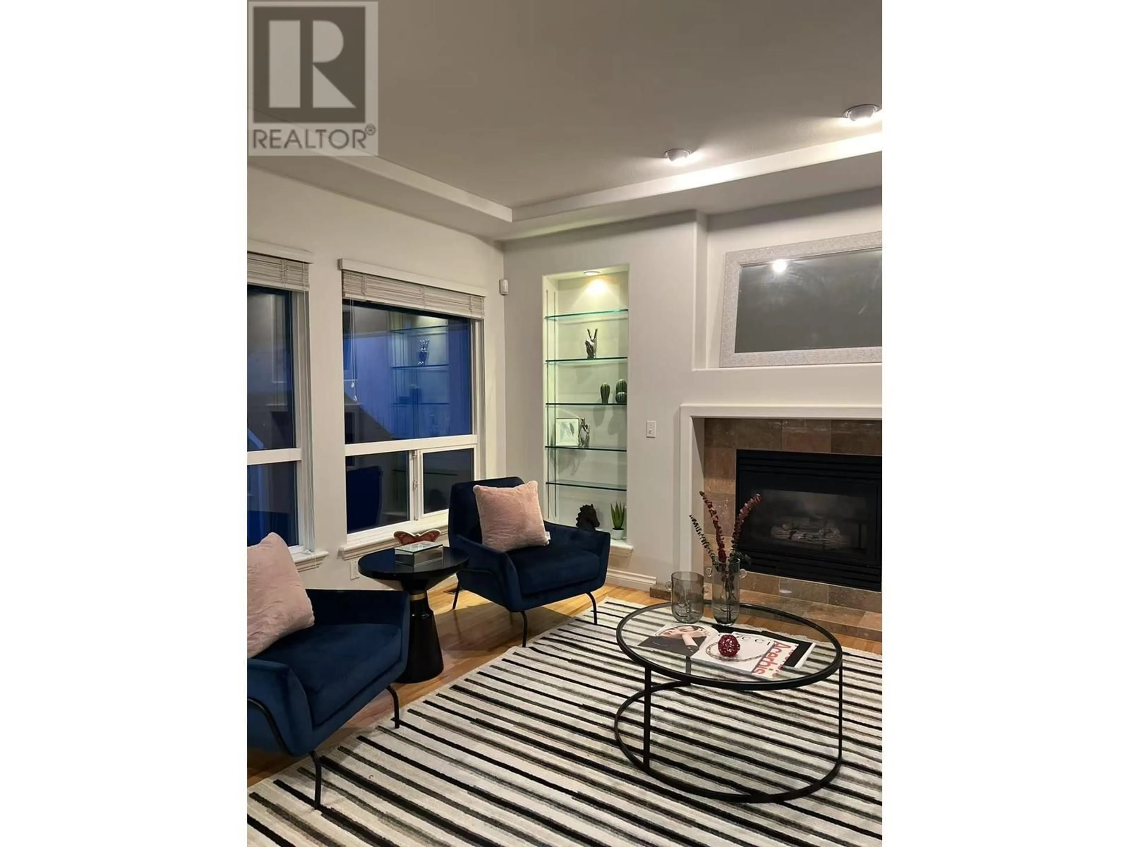 Living room with furniture, wood/laminate floor for 62 HETT CREEK DRIVE, Port Moody British Columbia V3H5B5