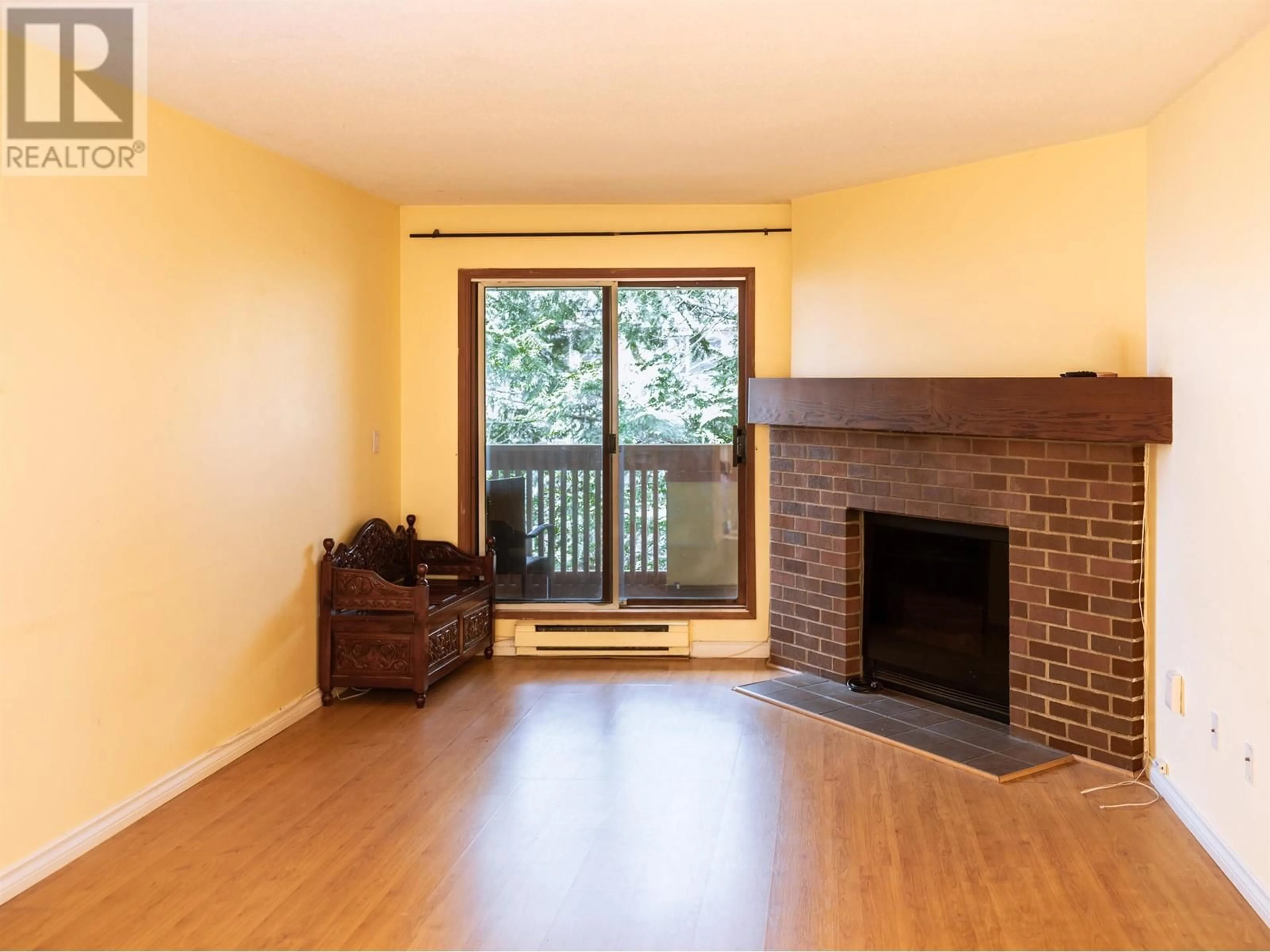 Living room with furniture, wood/laminate floor for 335 - 7651 MINORU BOULEVARD, Richmond British Columbia V6Y1Z3