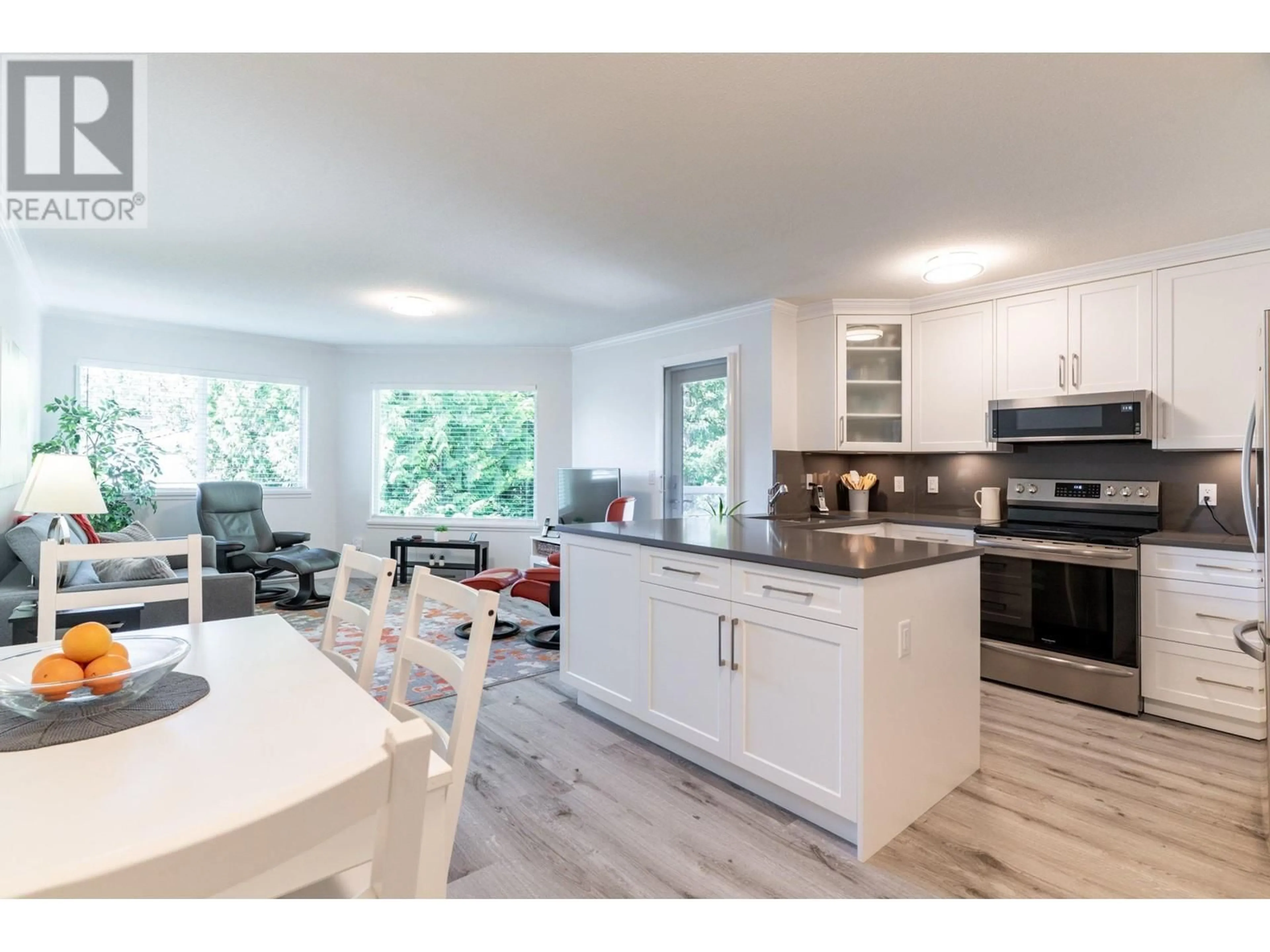 Open concept kitchen, wood/laminate floor for 406 - 450 BROMLEY STREET, Coquitlam British Columbia V3K6S5