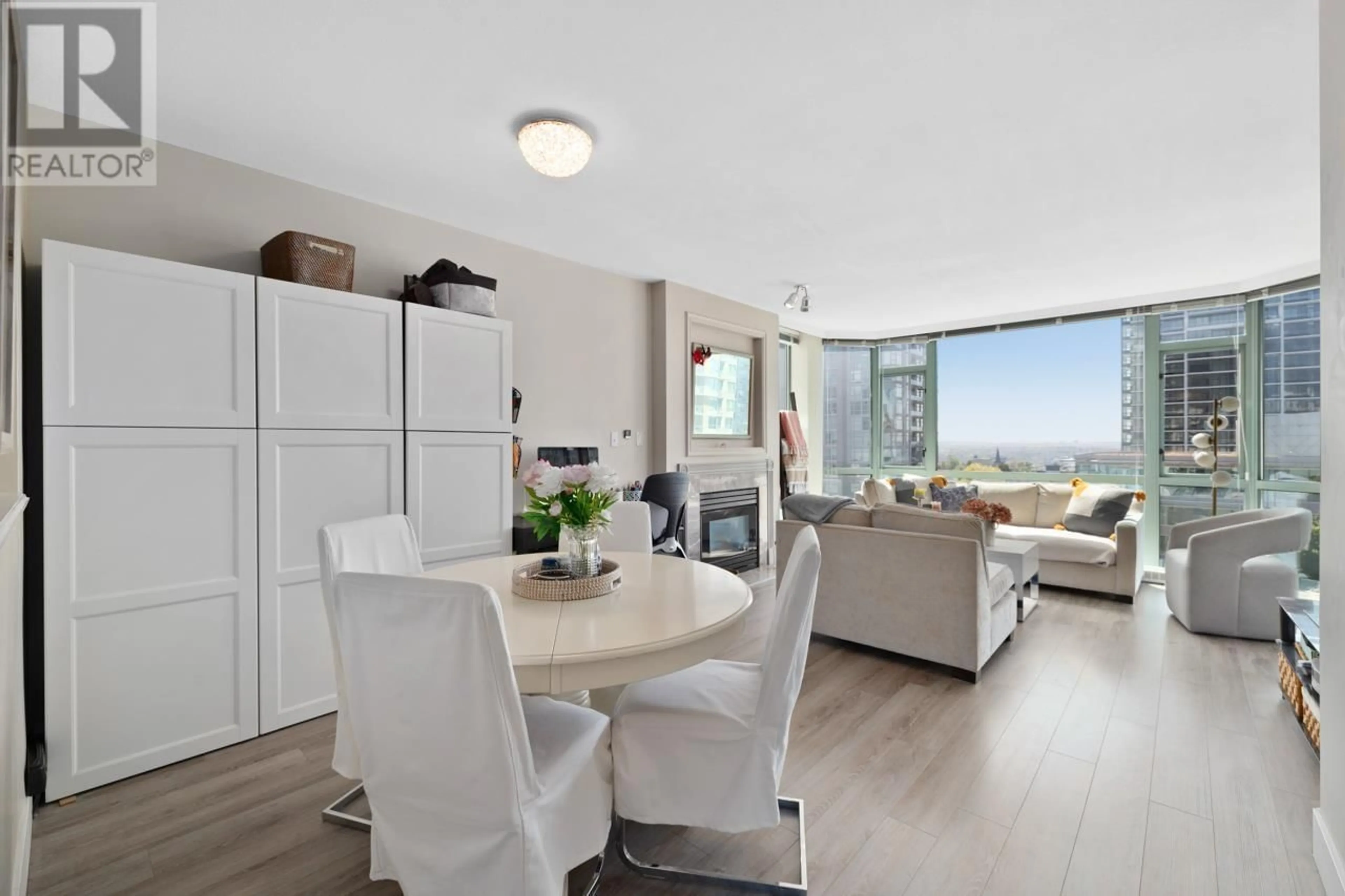 Living room with furniture, wood/laminate floor for 903 - 140 14TH STREET, North Vancouver British Columbia V7L2N3