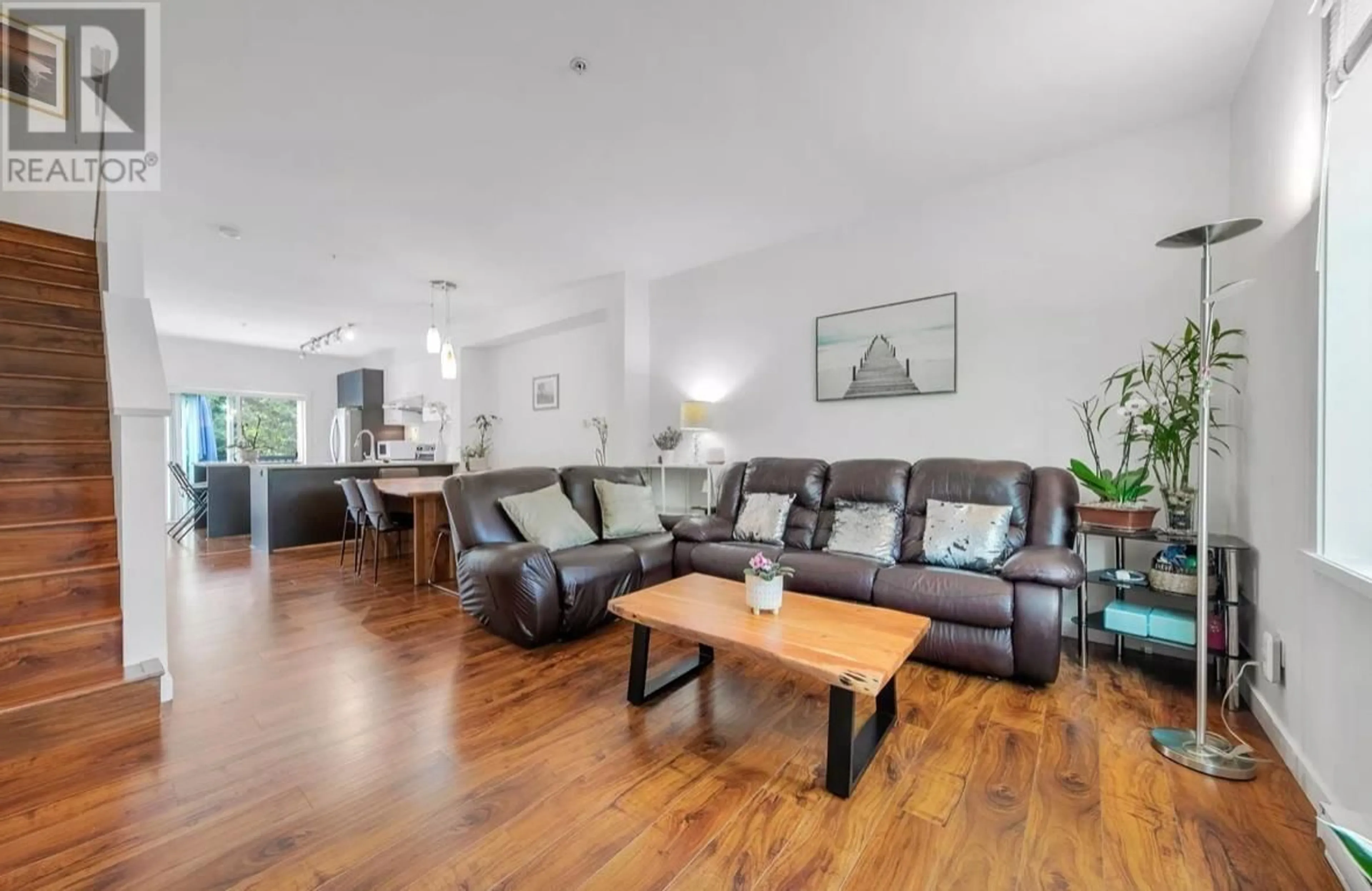 Living room with furniture, wood/laminate floor for 4033 - 2655 BEDFORD STREET, Port Coquitlam British Columbia V3C0B8
