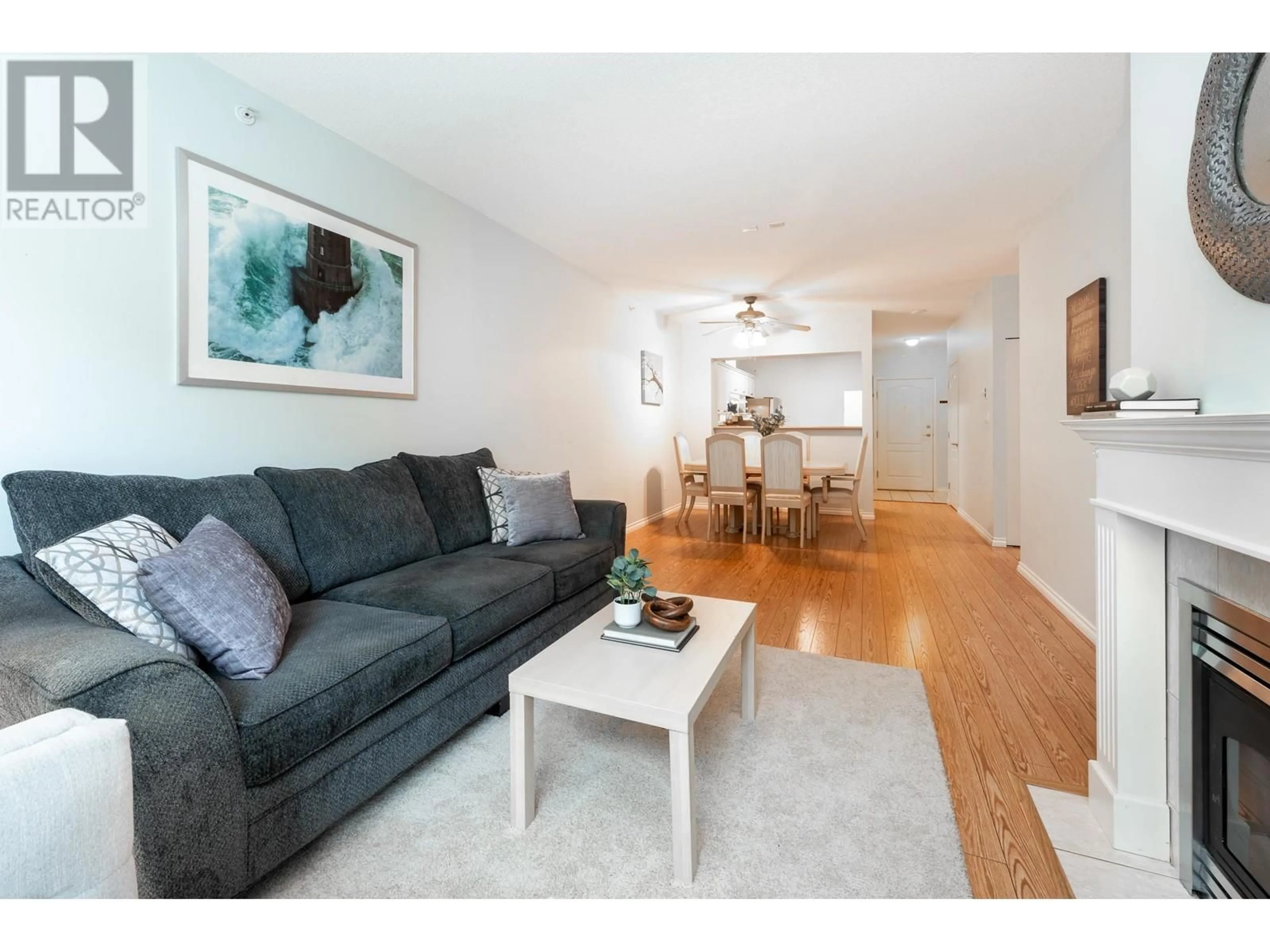 Living room with furniture, wood/laminate floor for 103 - 12148 224 STREET, Maple Ridge British Columbia V2X3N8