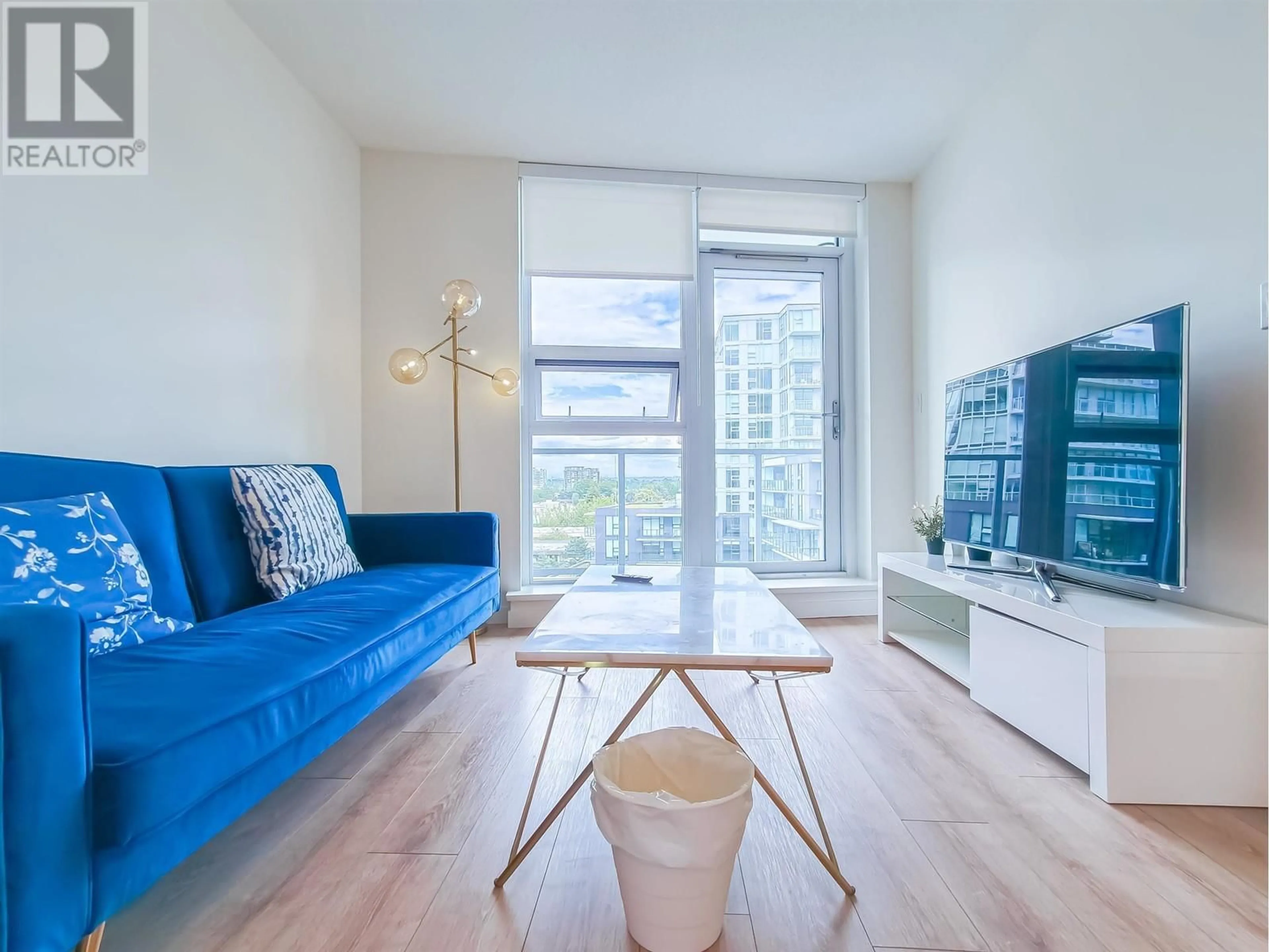 Living room with furniture, wood/laminate floor for 911 - 8111 PARK ROAD, Richmond British Columbia V6Y0M2