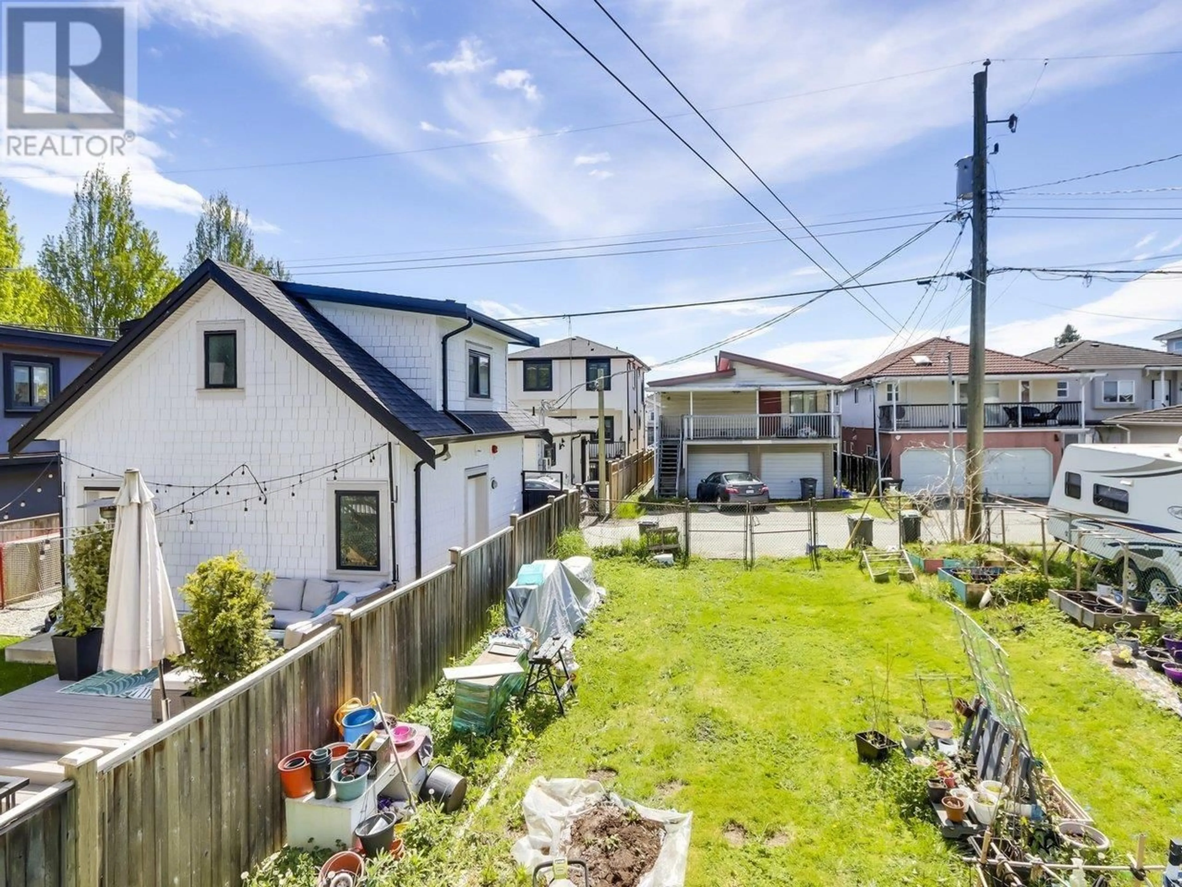 A pic from outside/outdoor area/front of a property/back of a property/a pic from drone, street for 3280 GEORGIA STREET, Vancouver British Columbia V5K2L3