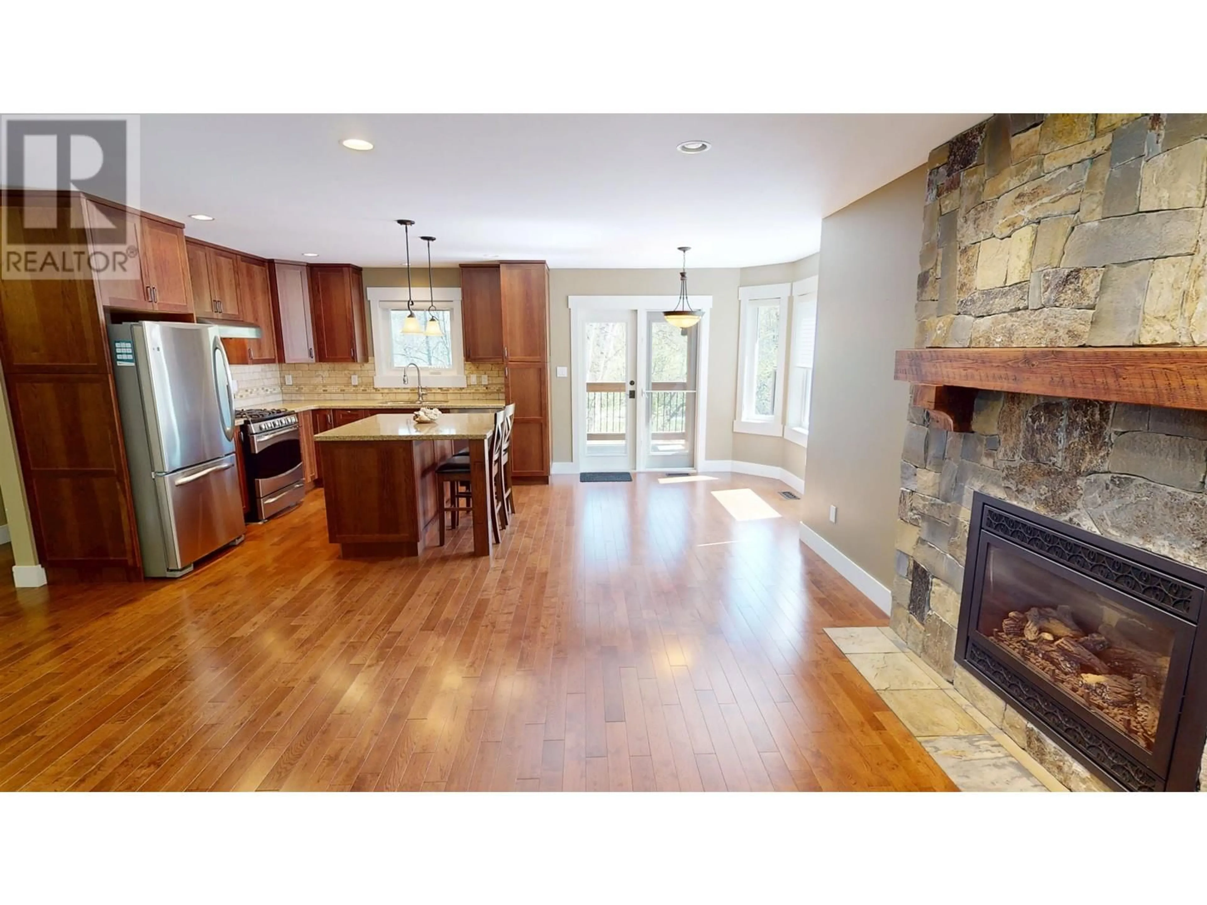 Open concept kitchen, wood/laminate floor for 1030 MCRAE ROAD, Quesnel British Columbia V2J6N8