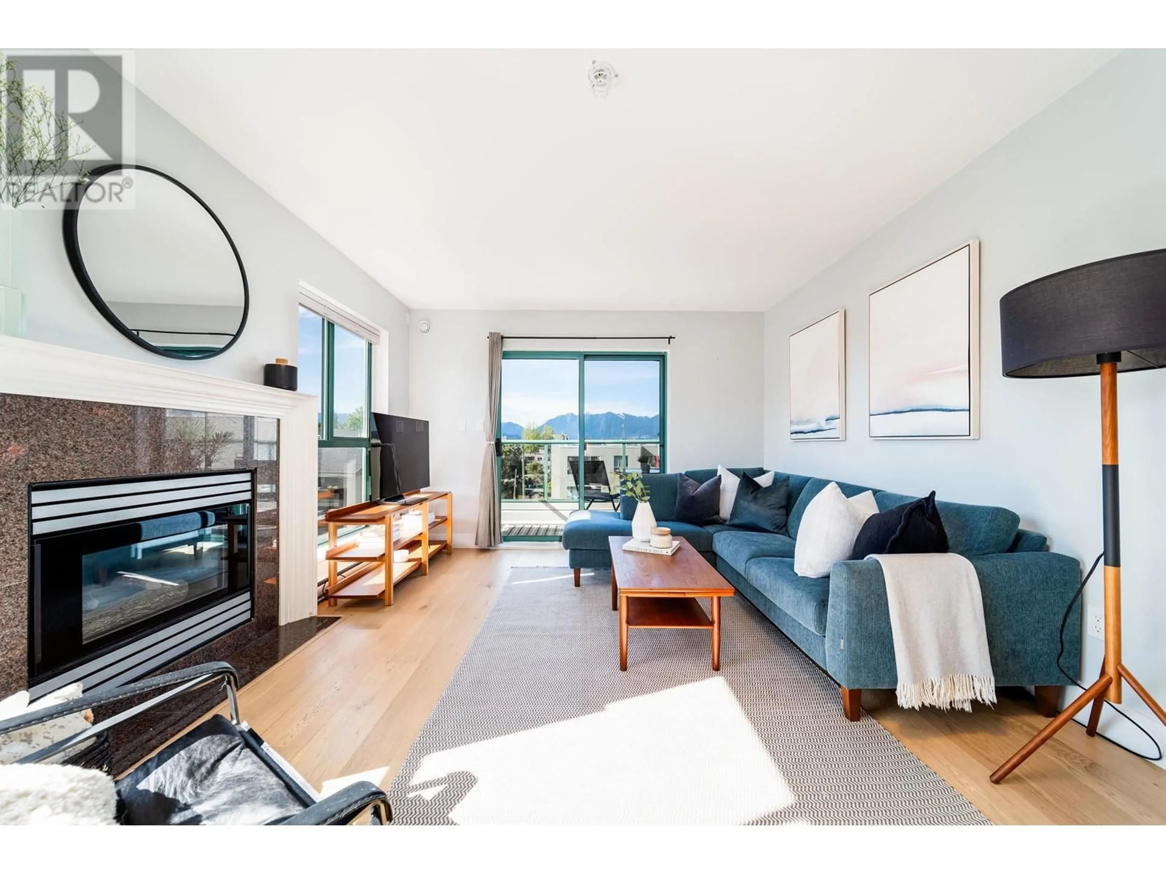 Living room with furniture, wood/laminate floor for 314 - 189 16TH AVENUE, Vancouver British Columbia V5T4R2