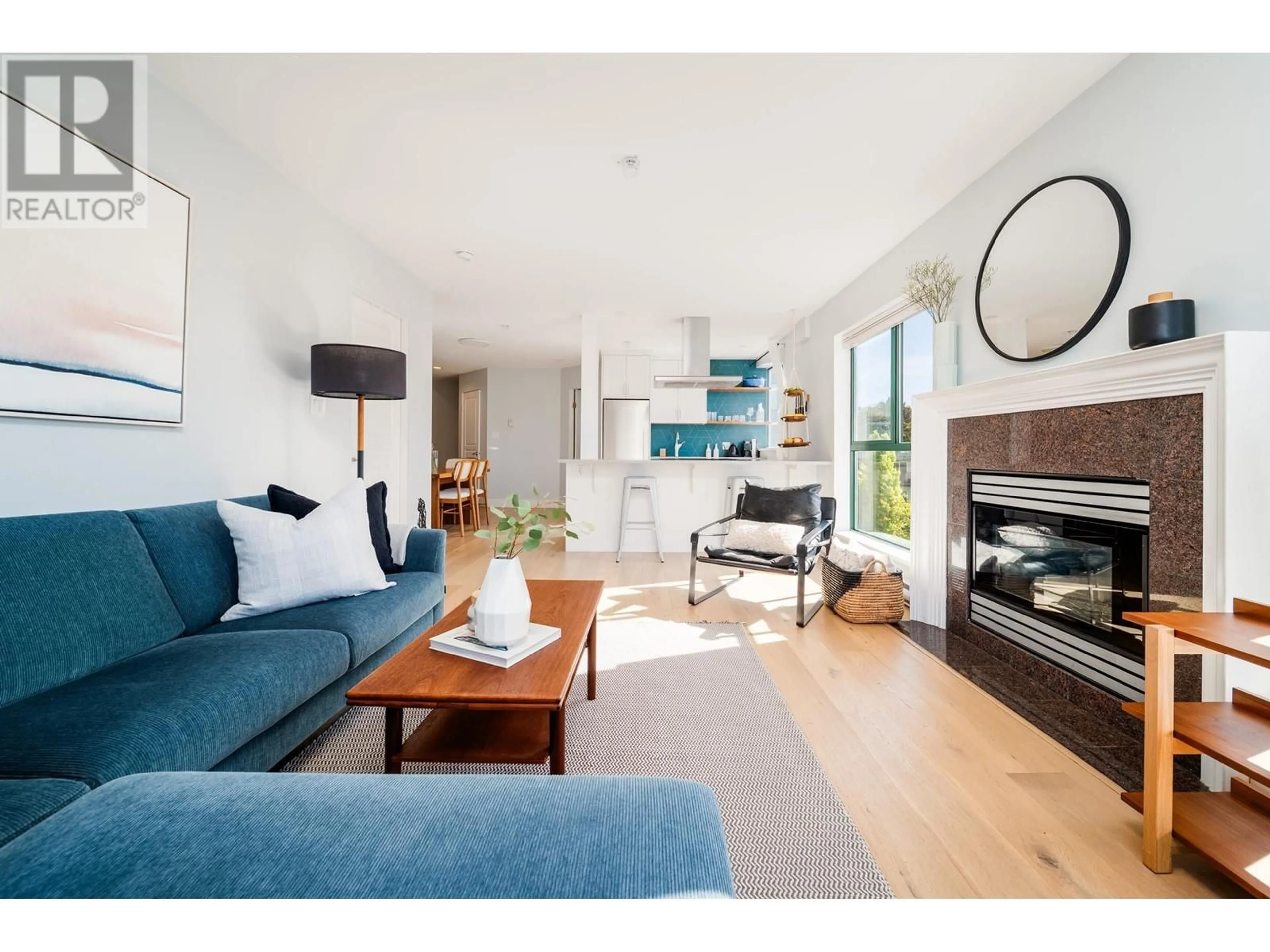 Living room with furniture, wood/laminate floor for 314 - 189 16TH AVENUE, Vancouver British Columbia V5T4R2