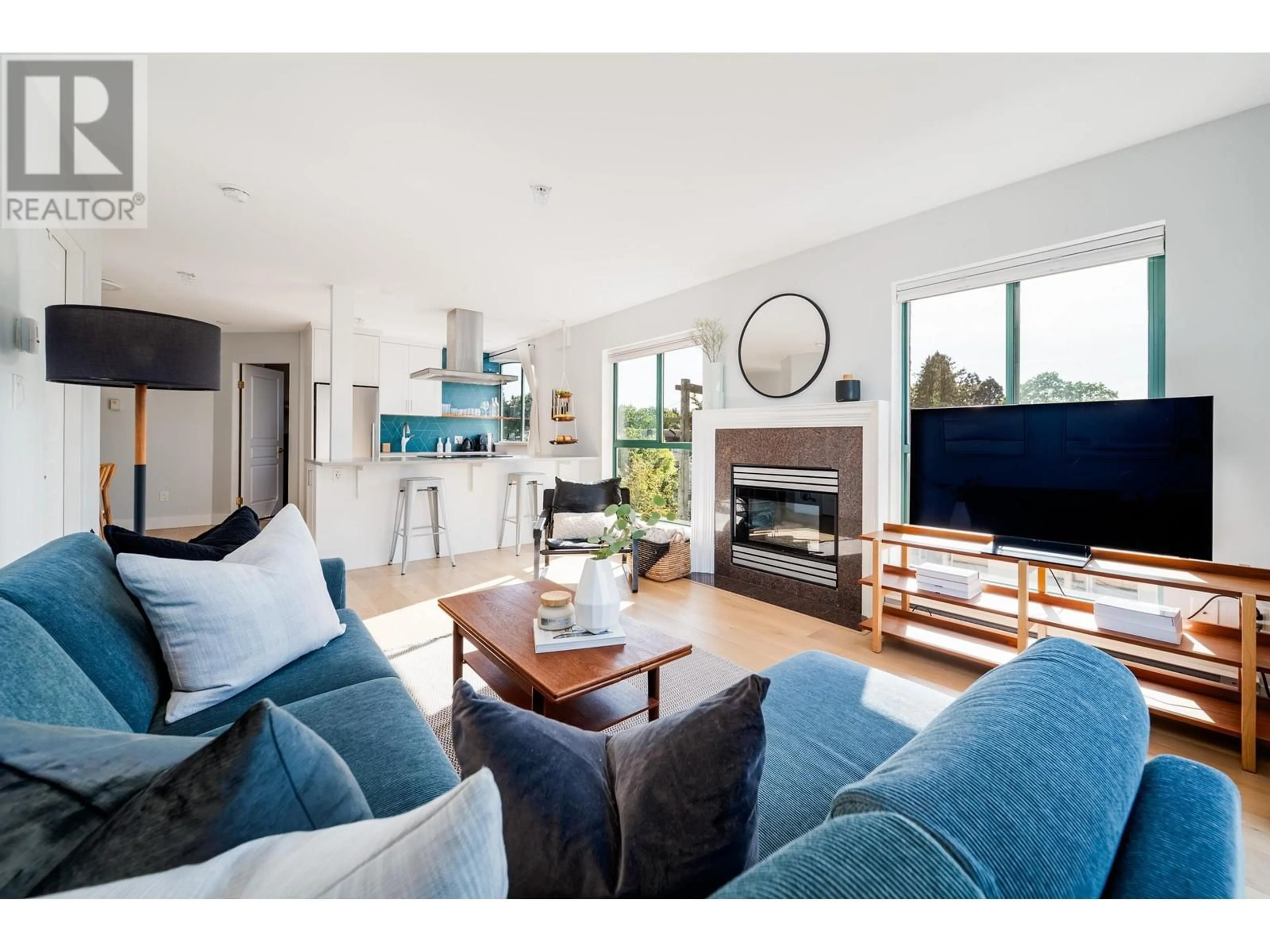 Living room with furniture, wood/laminate floor for 314 - 189 16TH AVENUE, Vancouver British Columbia V5T4R2