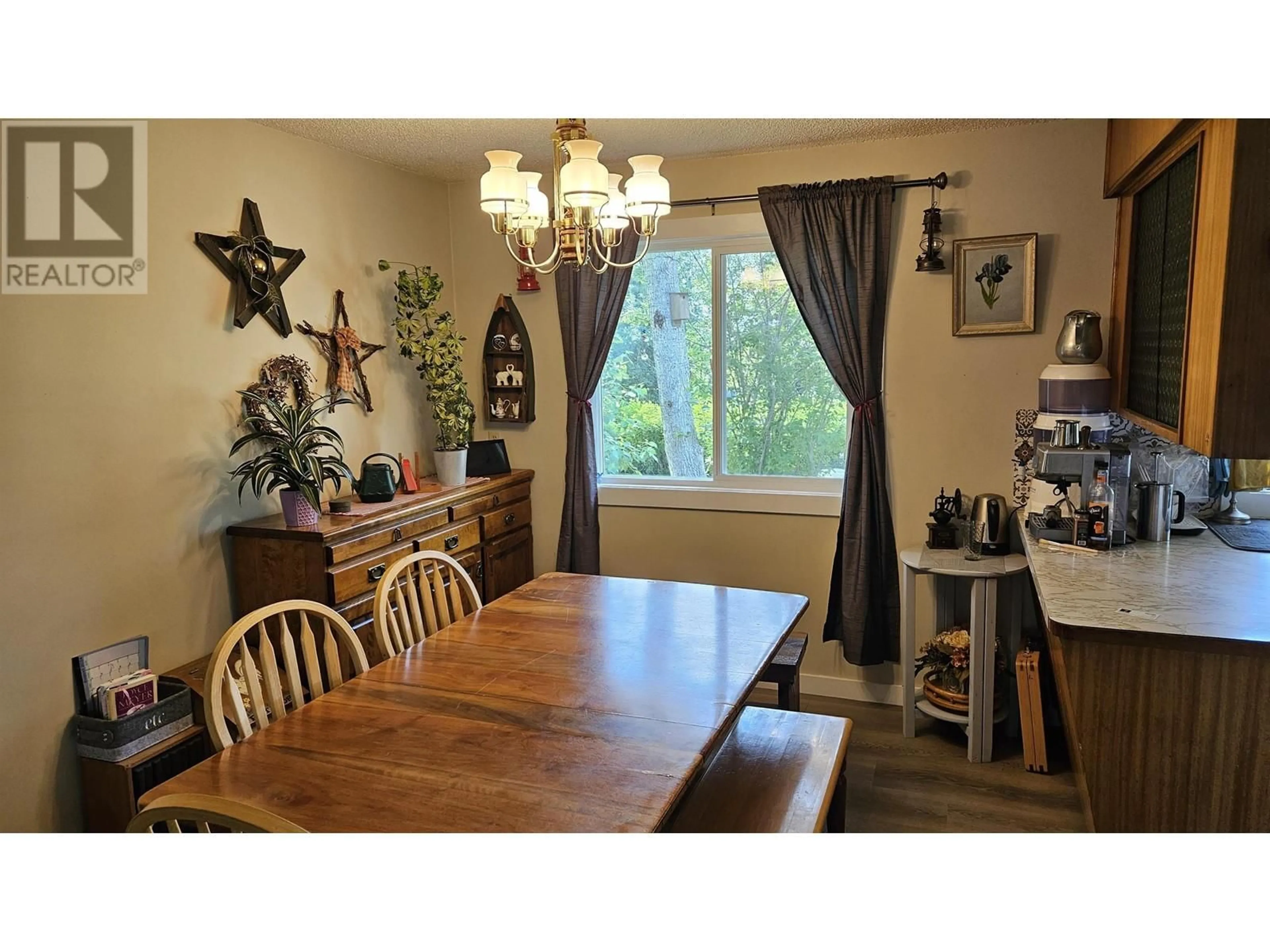 Dining room, wood/laminate floor for 6151 ROWANTREE AVENUE, Fort St. John British Columbia V0C1C0