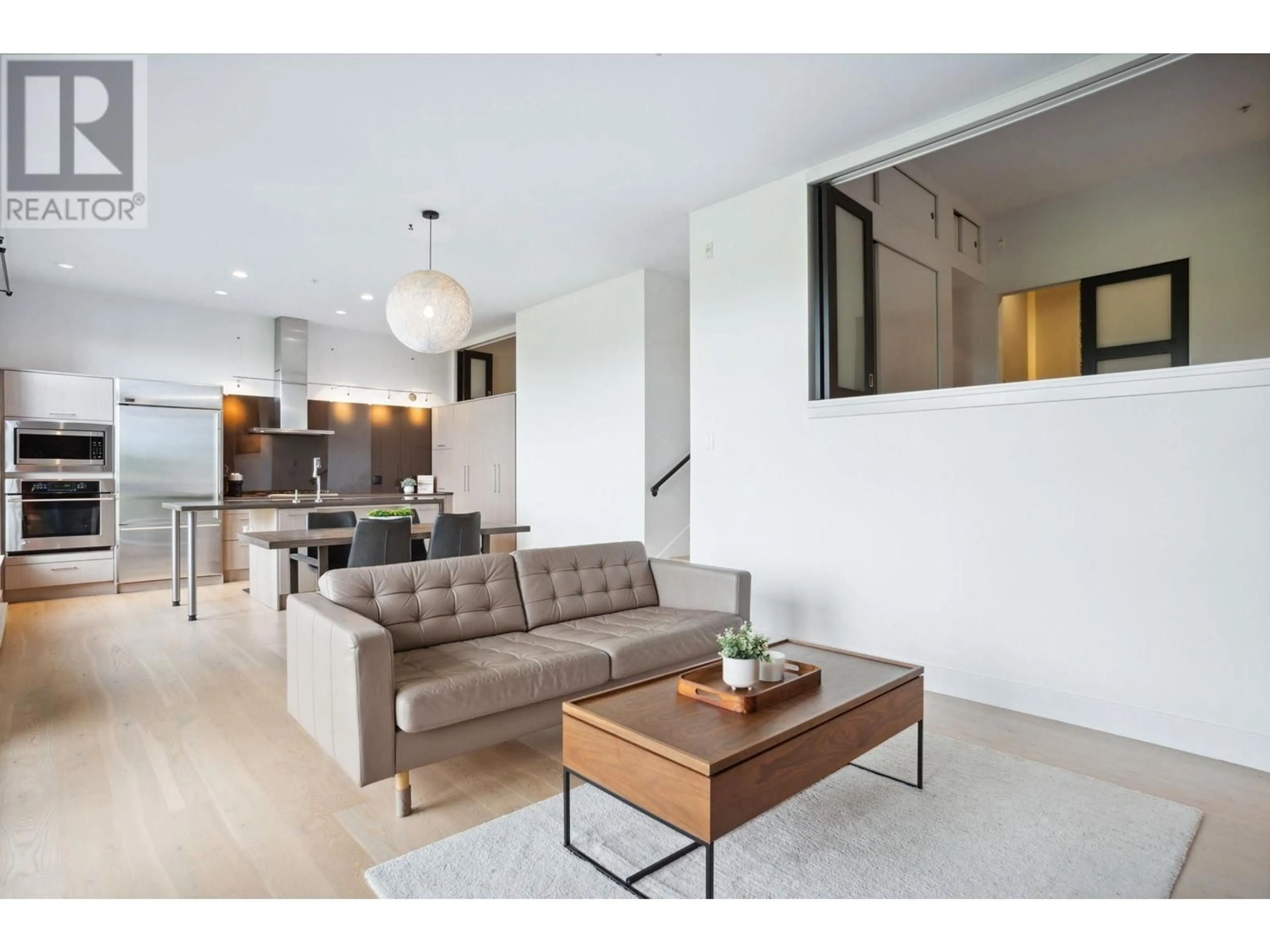 Living room with furniture, unknown for 302 - 220 SALTER STREET, New Westminster British Columbia V3M0H4